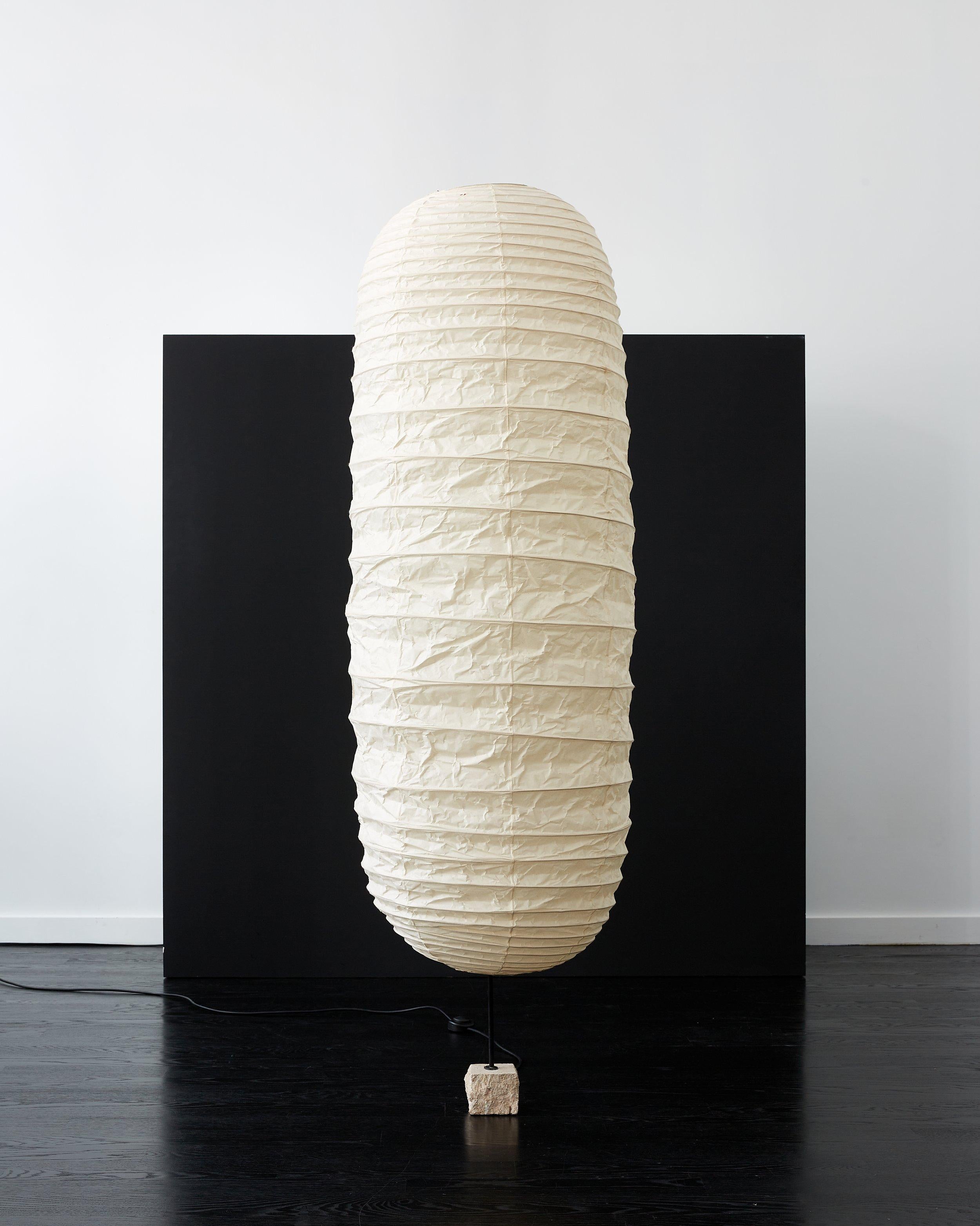 *Two available, each with different color ligurian stone. Sold separately.

Unique Isamu Noguchi Akari light sculpture, model 32N with sculpted Ligurian stone base. 

Japan & Italy c. 1977.

Hand-made washi paper shade by Ozeki & Co. Ltd., Gifu,