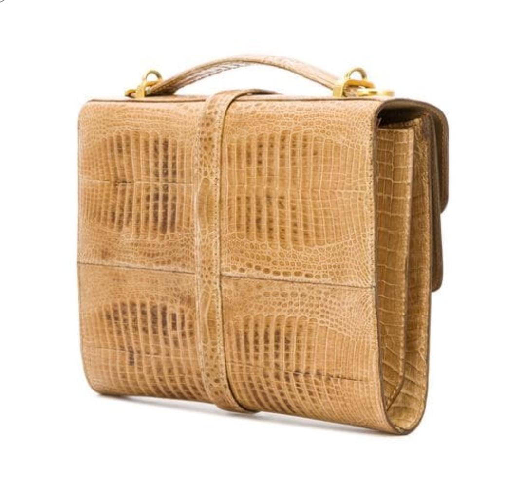 Unique design for this beautiful color of baby crocodile handbag. Love the shape and style also without the shoulder strap removable. 
Size: 22 x 15.5 x 4 cm - 8 2/3 x 6.1 x 1.6 in. 
Marked: Gino Cromba - Artists in hand made crocodile handbags