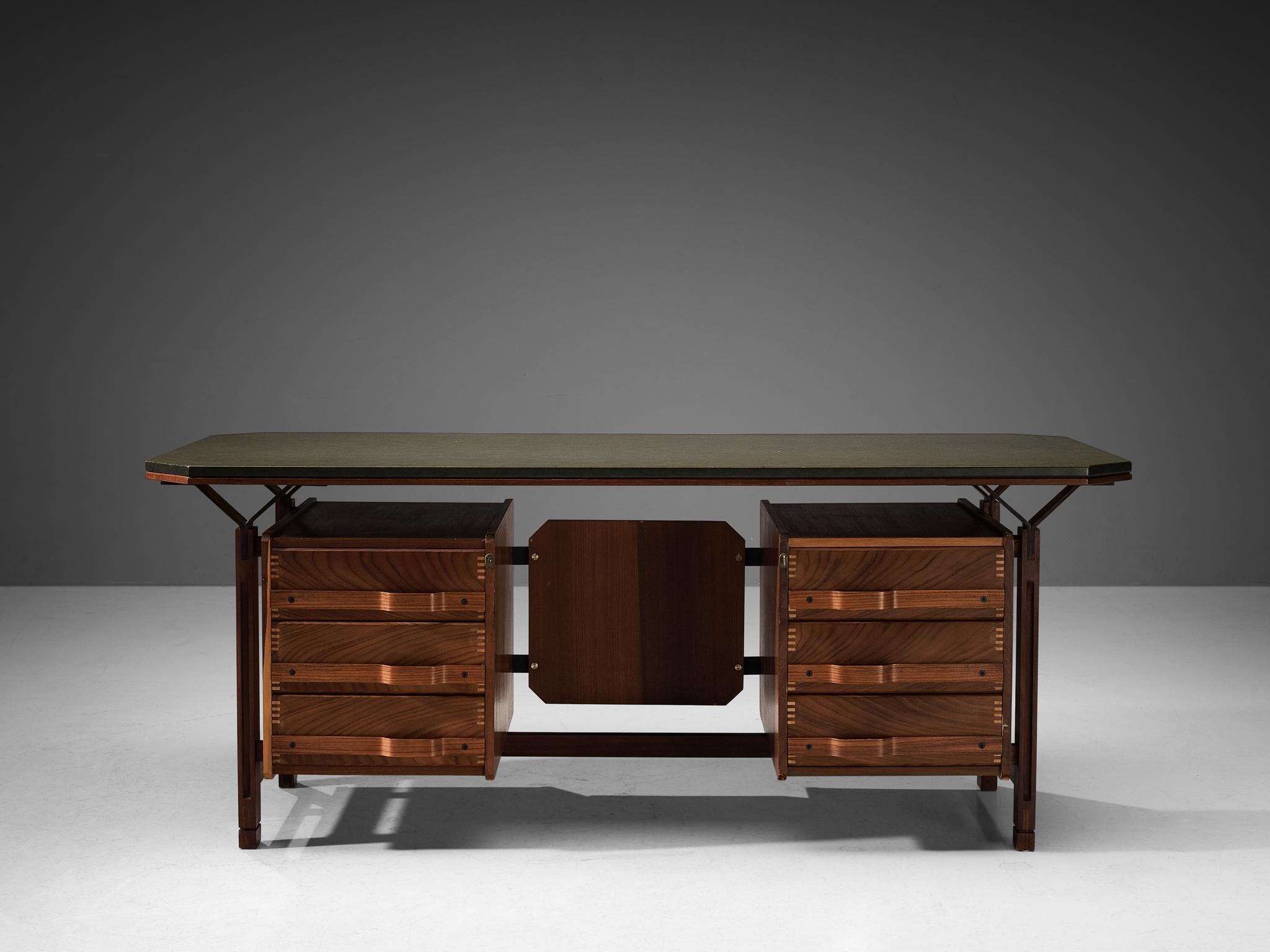 Writing desk, teak, vinyl, brass, plywood, beech, Italy, circa. 1960

This highly refined desk that originates from Italy strongly resembles the work by the acknowledged master of Italian mid-century design Ico Parisi (1916-1996). His design