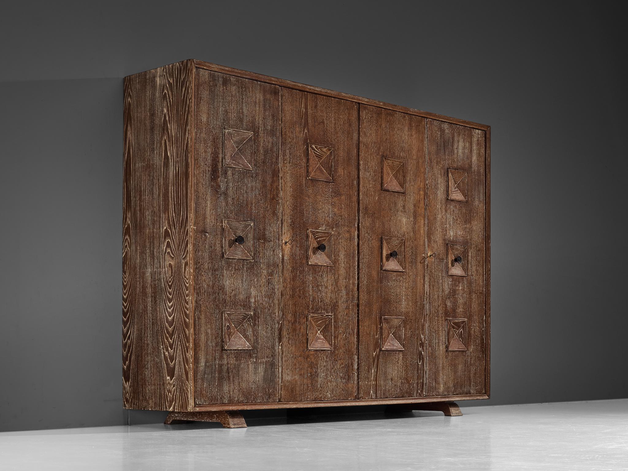 Wardrobe, cerused chestnut, Italy, early 1940s

This delightful Italian-made armoire, originating from roughly the early 1940s, is a stunning representation of the artistic craftsmanship associated with fine woodworking. It is worth highlighting the