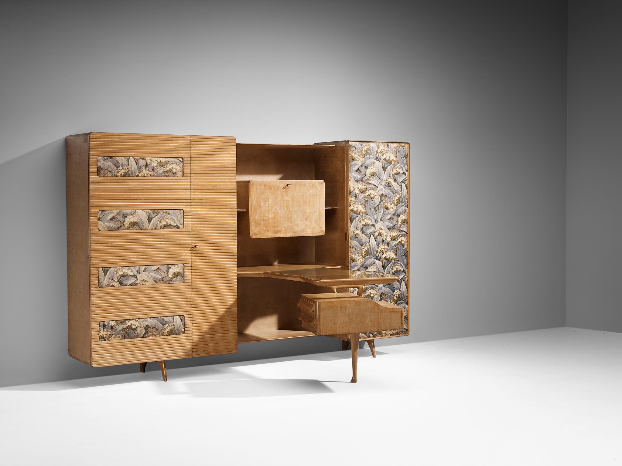 Wardrobe with writing desk, birch, maple, fabric, glass, brass, coated steel, Italy, 1950s

Hailing from a skilled artisan of Italy, this exceptional set embodies a unique combination of a wardrobe and writing desk, reflecting the design principles