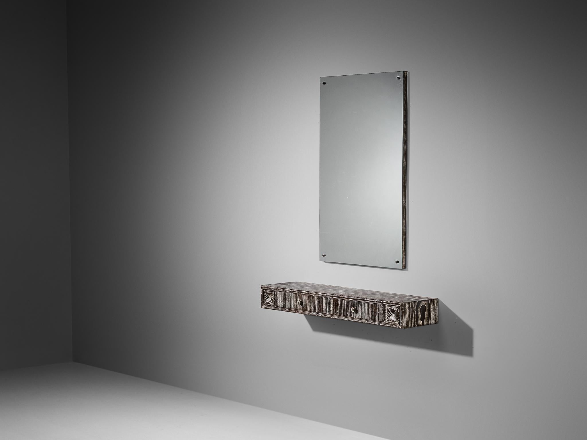 Wall-mounted console with mirror, cerused chestnut, mirrored glass, Italy, early 1940s

This delightful Italian-made wall-mounted shelf with mirror, originating from roughly the early 1940s, is a stunning representation of the artistic craftsmanship