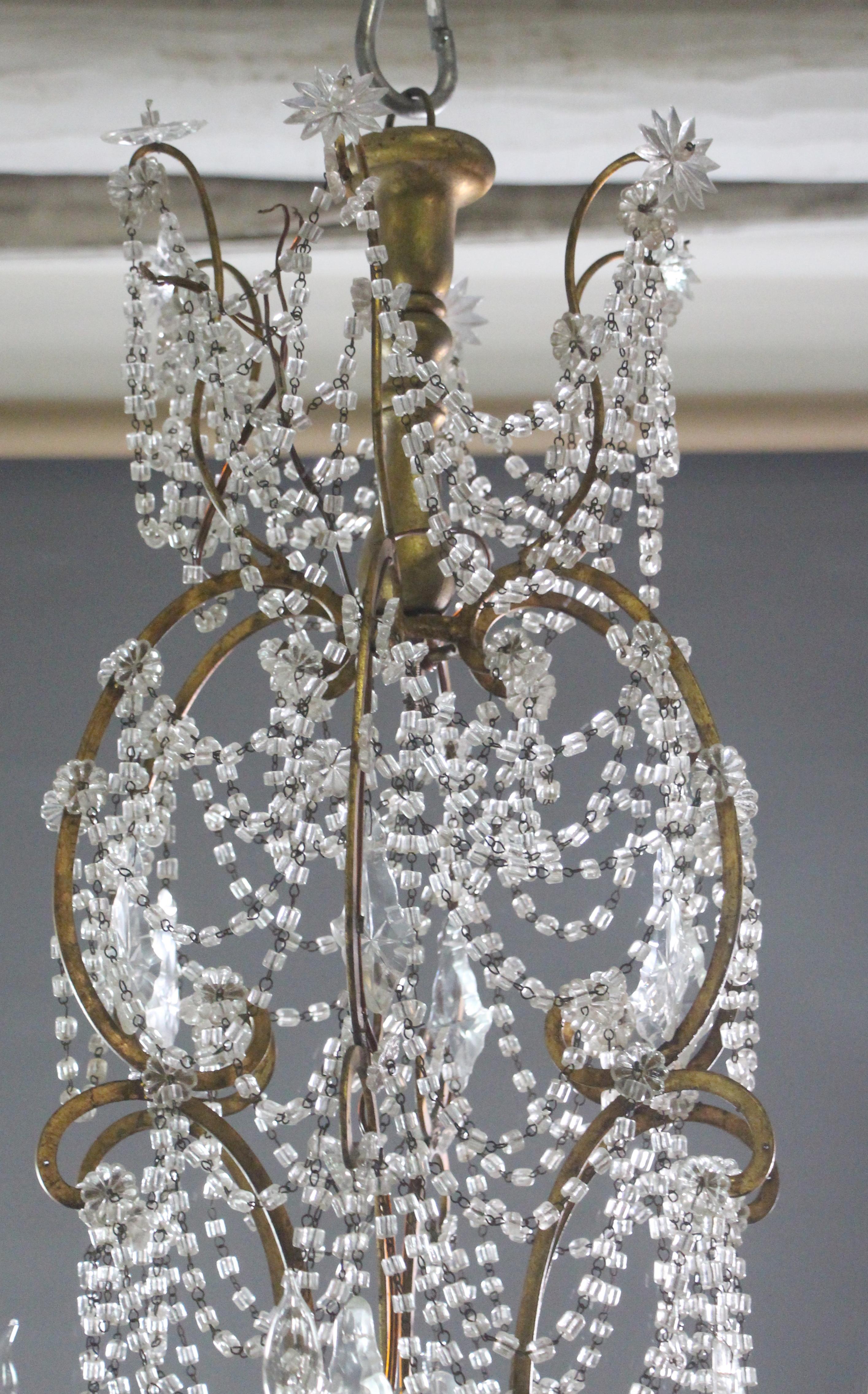 Unique Italian Wood Gilded Iron Beaded Crystal Chandelier w/ 18 Lights In Good Condition For Sale In New York, NY