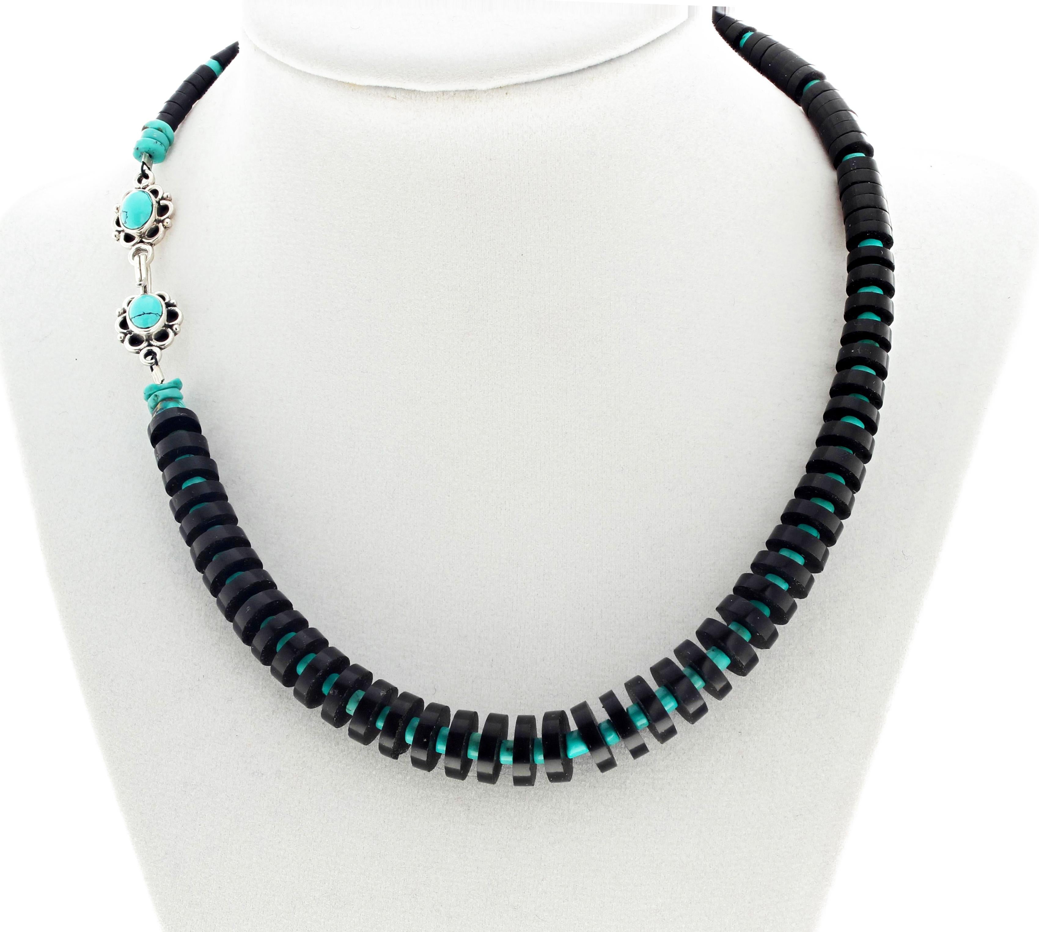 Jet Stone is also called Black Amber, Lignite, and Gem Lignite and its a highly polished shining black gemstone set with Turquoise rondels.  The largest Jet is 11 mm across and is 17 inches long.  This is set in an irregular handmade design to give