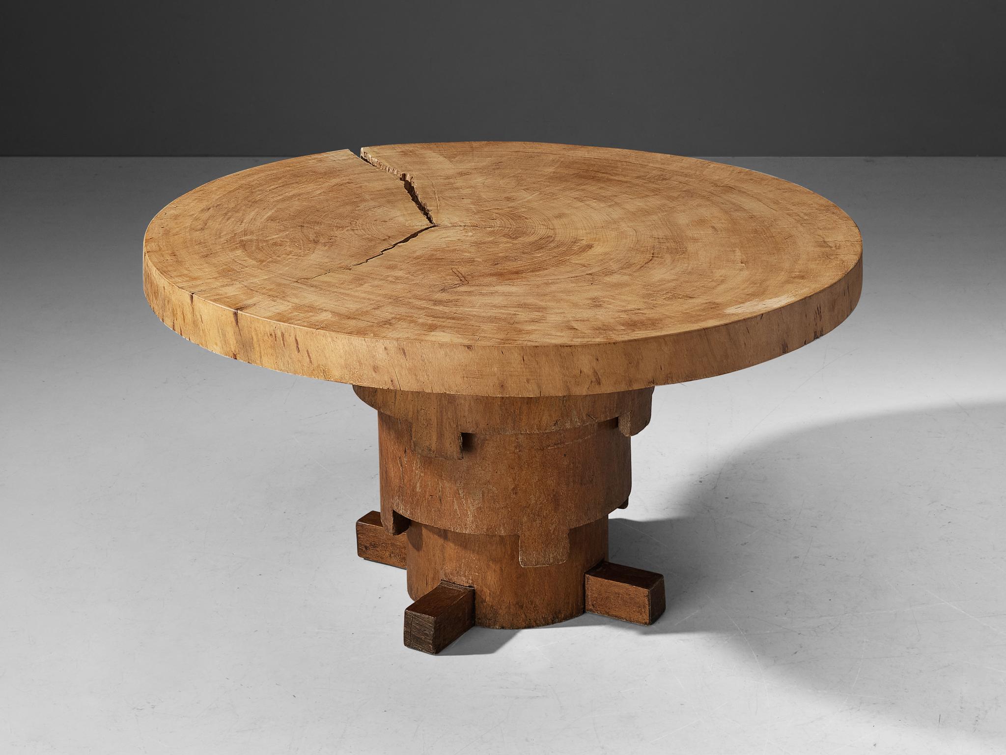 José Zanine Caldas, unique dining table 'Denuncia', Brazilian hardwood, Brazil, 1970s 

This remarkable hand-carved table is the handiwork of the Brazilian artist José Zanine Caldas. This table belongs to the Denuncia series, a collection crafted by