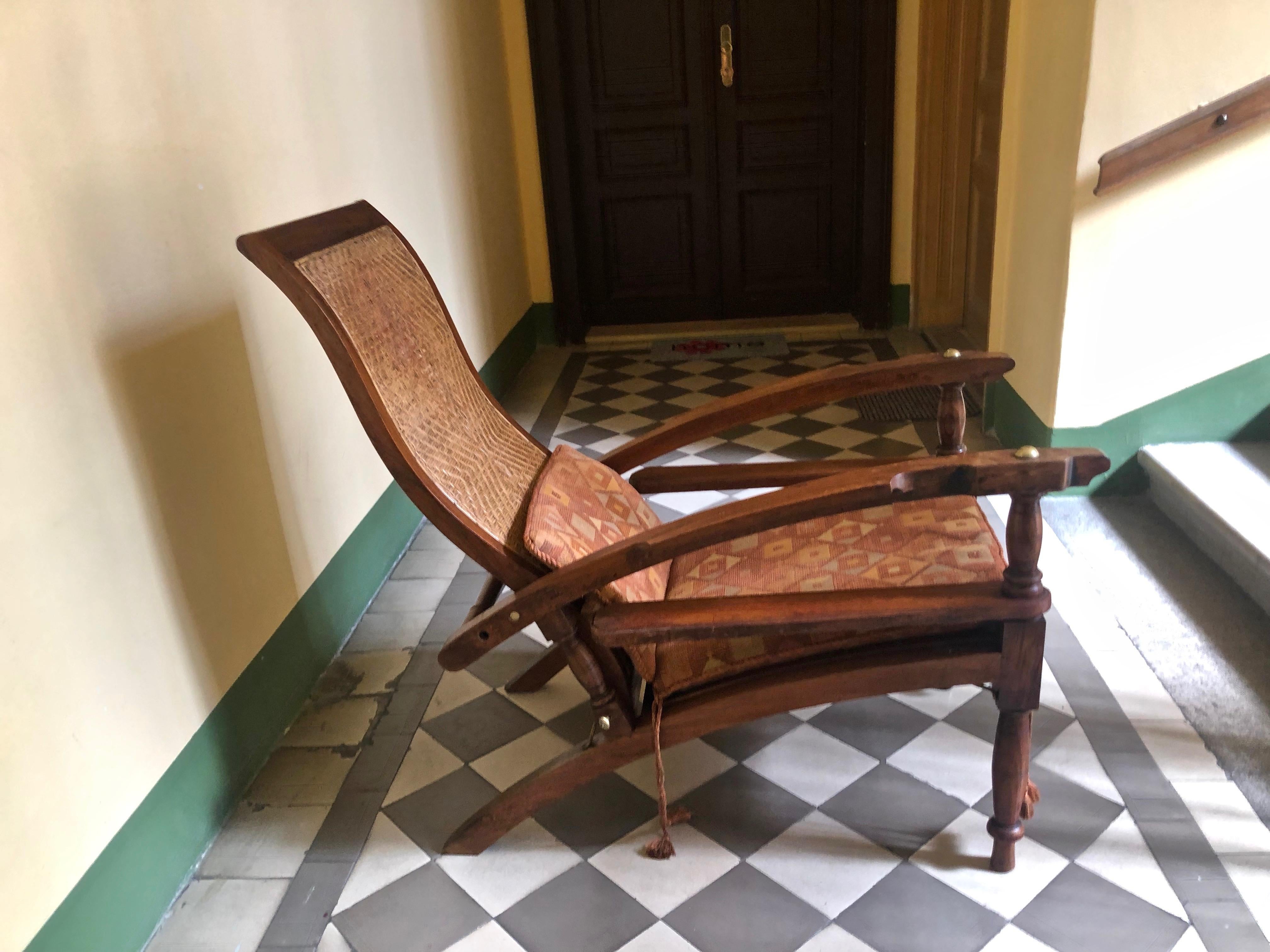 This is a special arm chair designed by the owner and made by a furniture maker in India. Robert Haardt was the
owner and designer of this lounge chair. While travelling for his families business in India, ( enamelled metal
products ), he