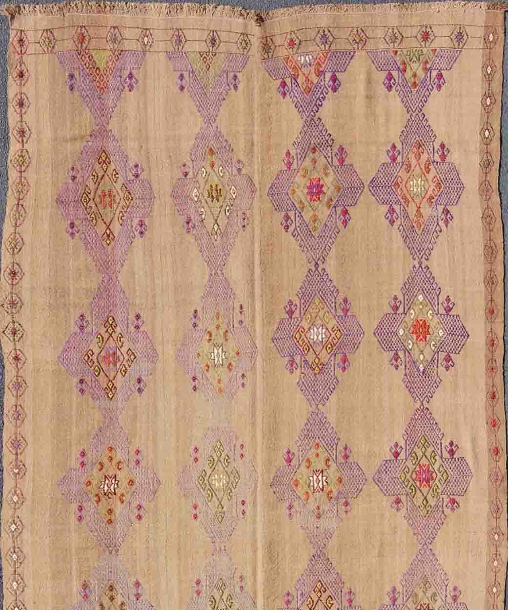 Tribal Turkish Kilim Hand Woven Embroidered Purple Diamonds on a Tan Background For Sale