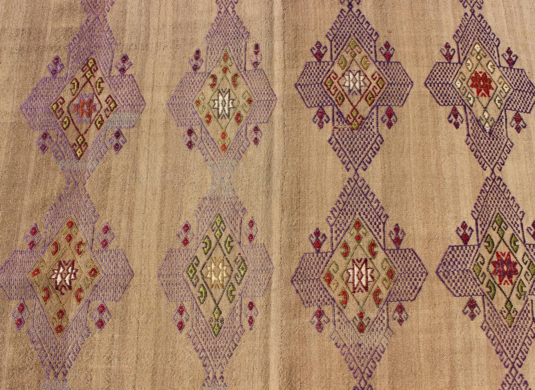 Hand-Woven Turkish Kilim Hand Woven Embroidered Purple Diamonds on a Tan Background For Sale