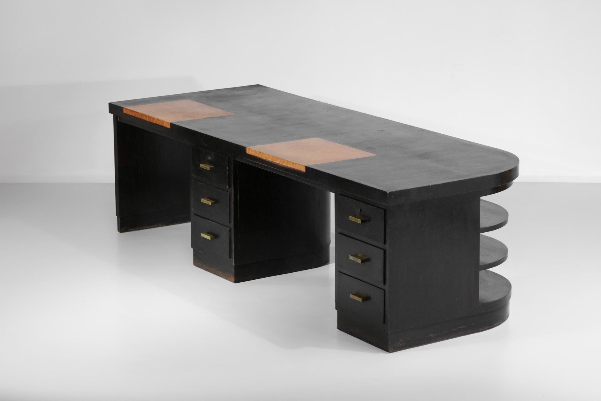 Large modernist two-seater desk from the 1940s by Grenoble architect Pierre Pouradier Duteil. Structure in solid oak wood stained in black and two burr-wood desk legs in lemon tree. This double desk is composed of two columns of three drawers with