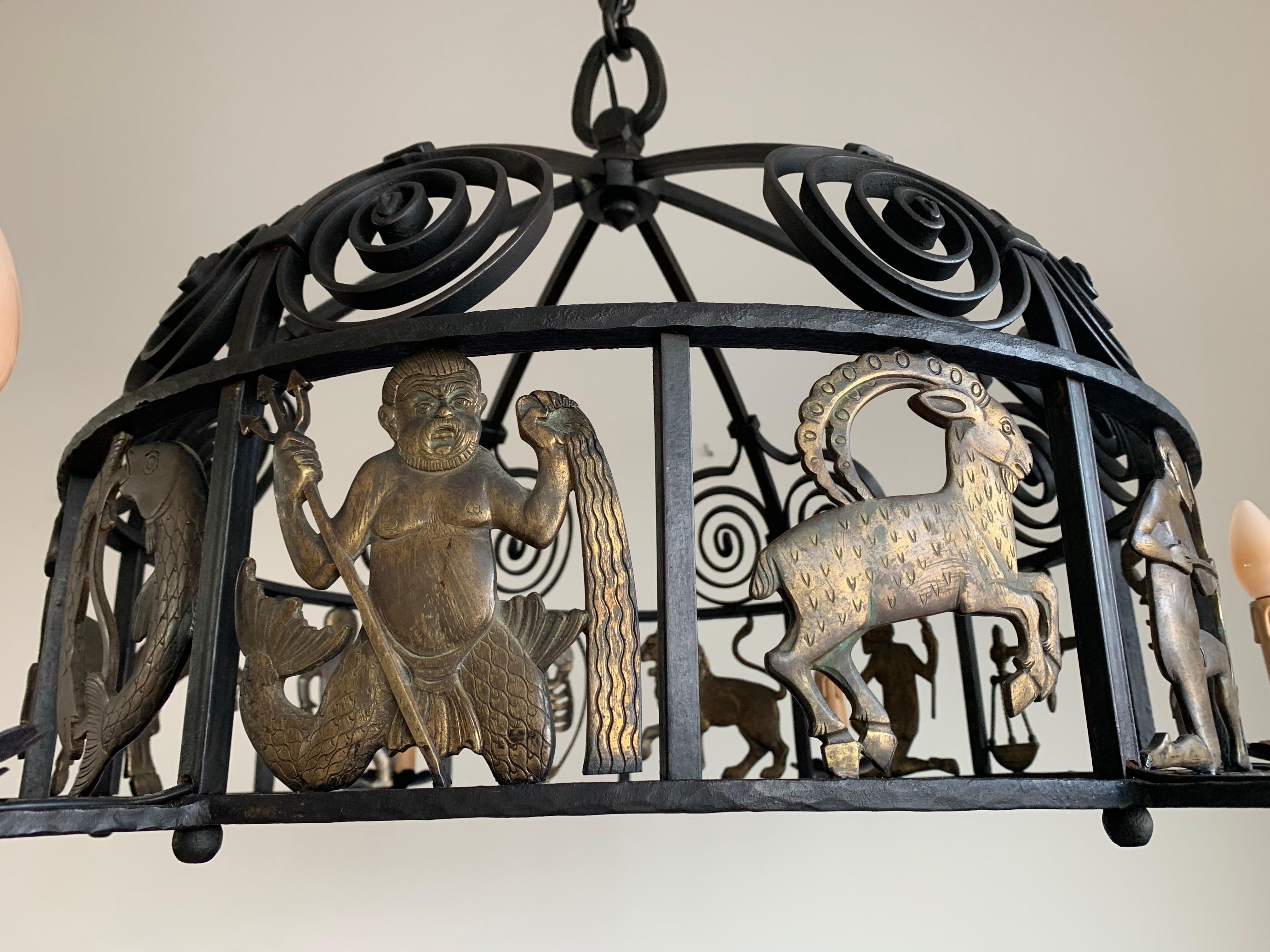 Arts and Crafts Unique and Large Arts & Crafts Wrought Iron Chandelier with Bronze Zodiac Signs