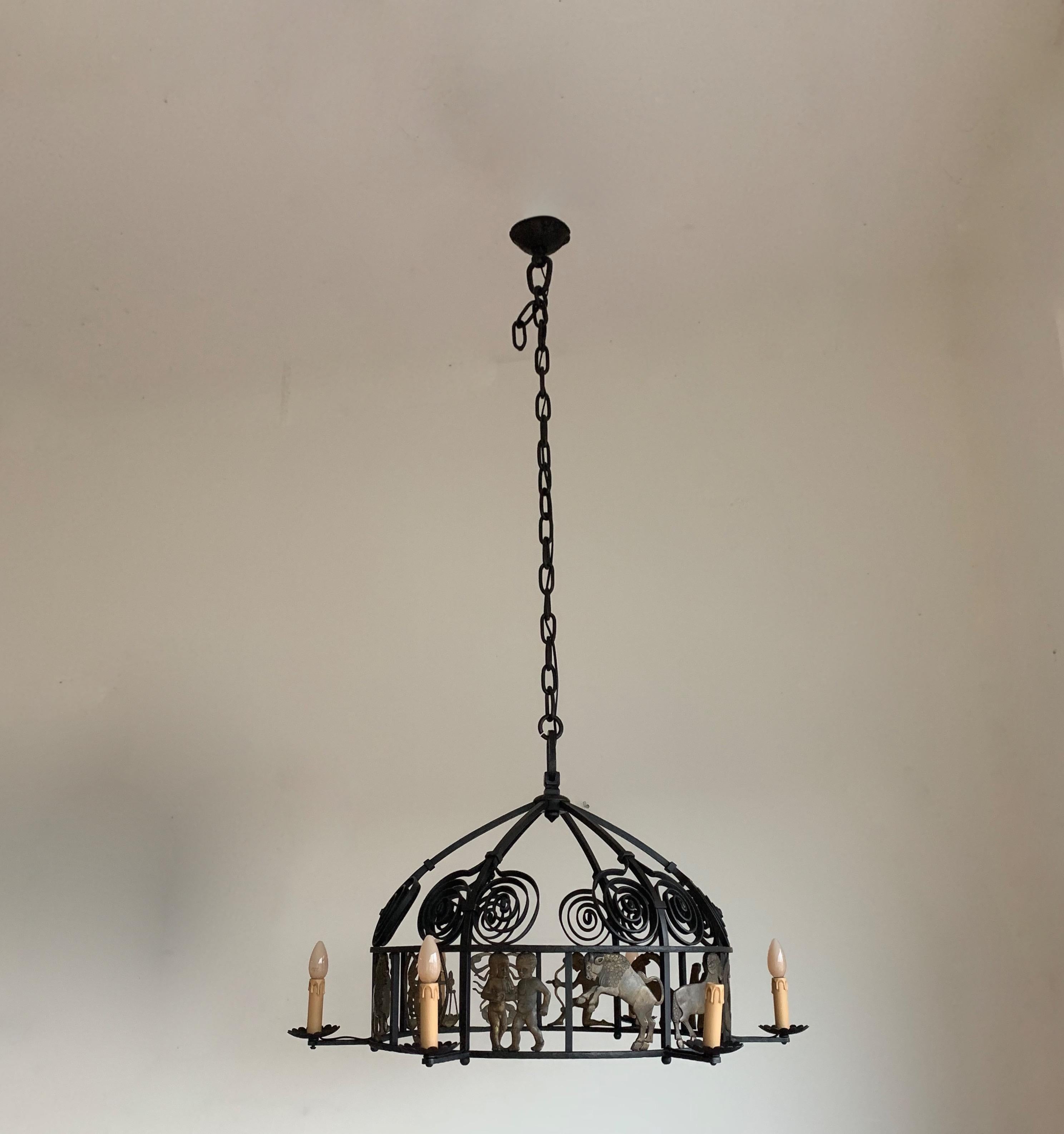 Blackened Unique and Large Arts & Crafts Wrought Iron Chandelier with Bronze Zodiac Signs