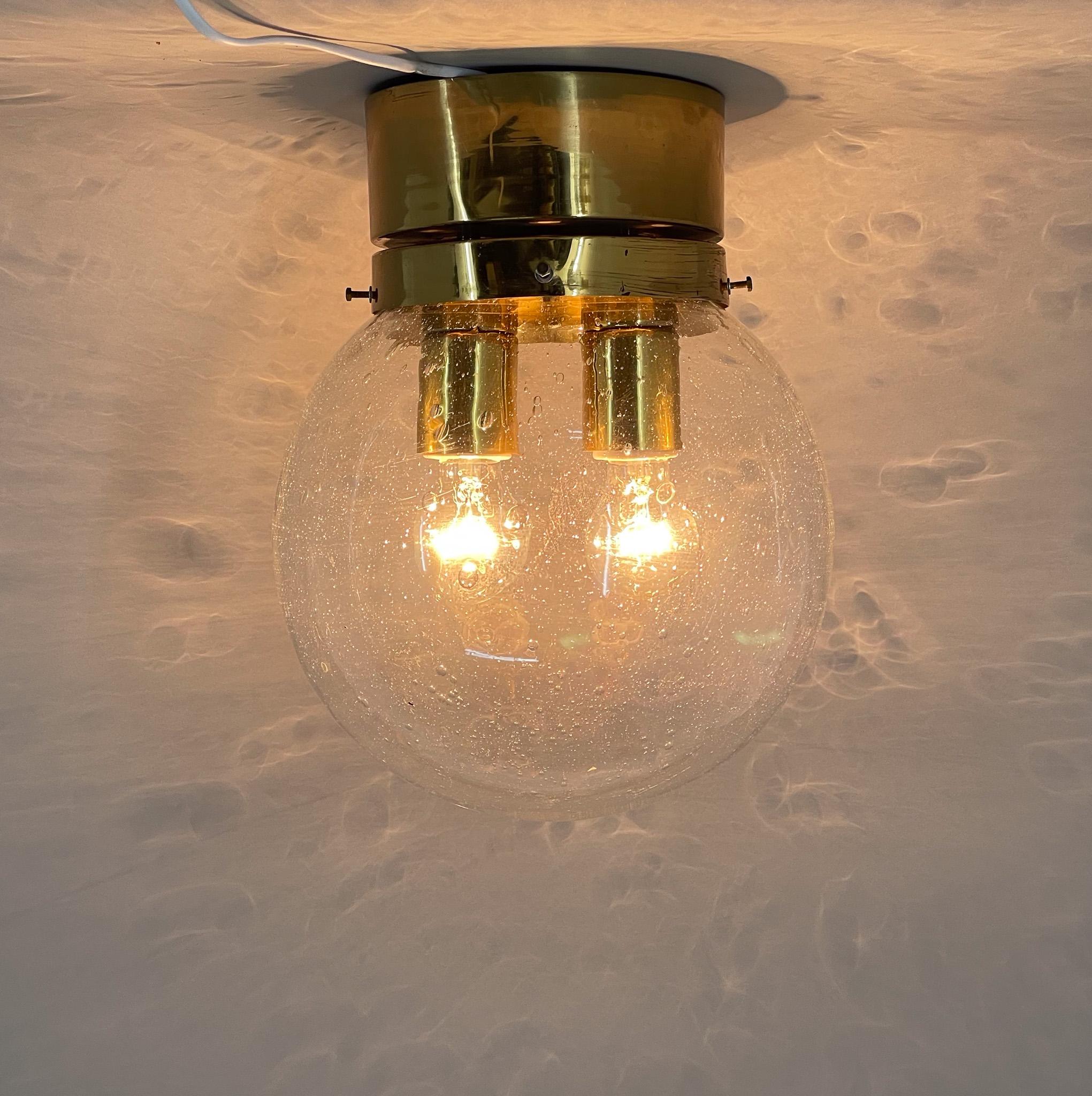Large ceiling light or possibly a wall light made of brass and bubble glass. Good original condition (see photo). Marked by the manufacturer. Produced in former Czechoslovakia by the famous Kamenický Šenov in the 1970's. Bulbs: 2x E26 or E27. US