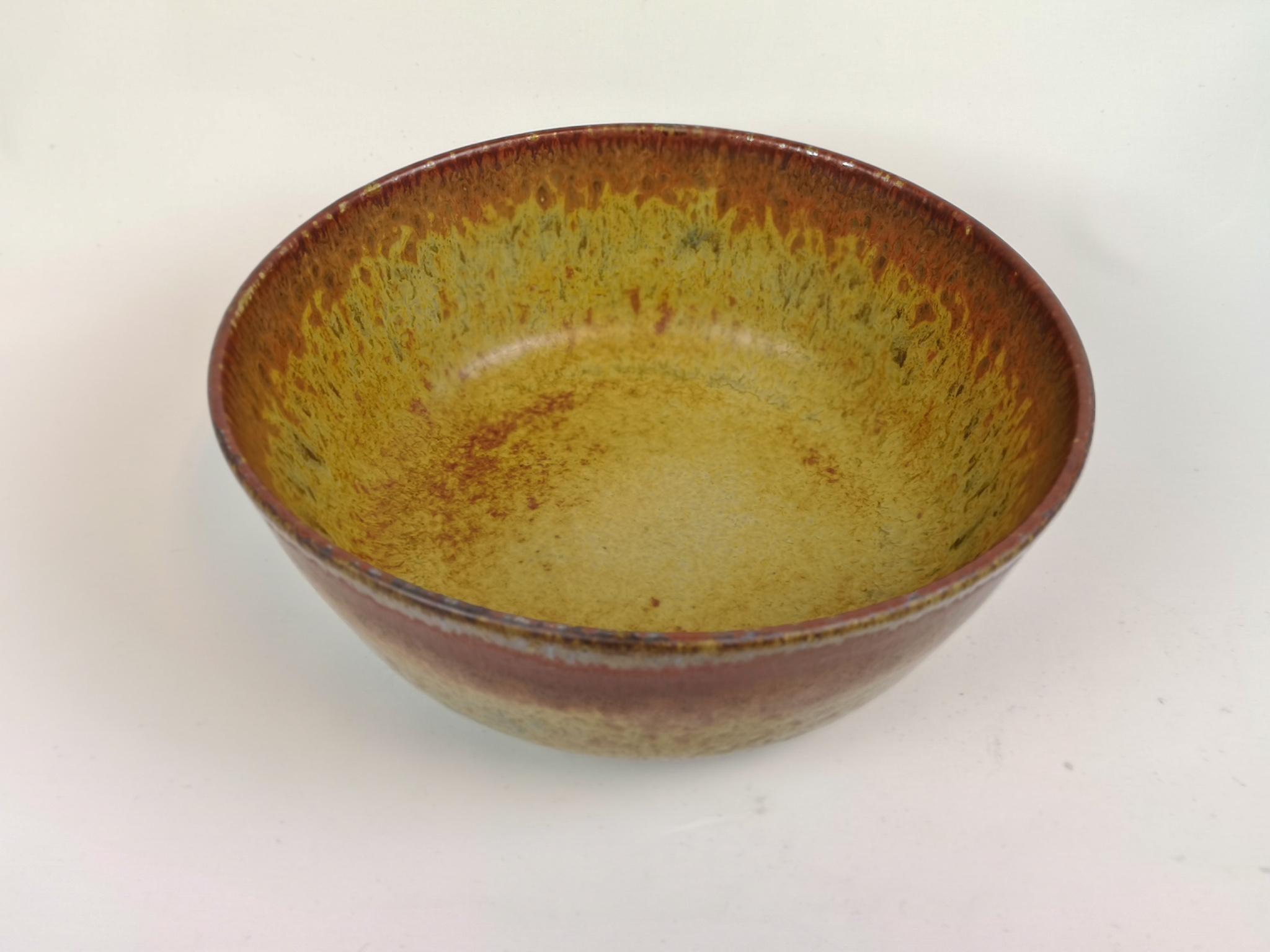 This large unique bowl has a wonderful glaze. It’s made in Sweden at Rörstrand and designed by Carl-Harry Stålhane. There’s only one of its kind and is therefore a spectacular piece to have. Its stunning in its design and deep glaze pattern. Signed