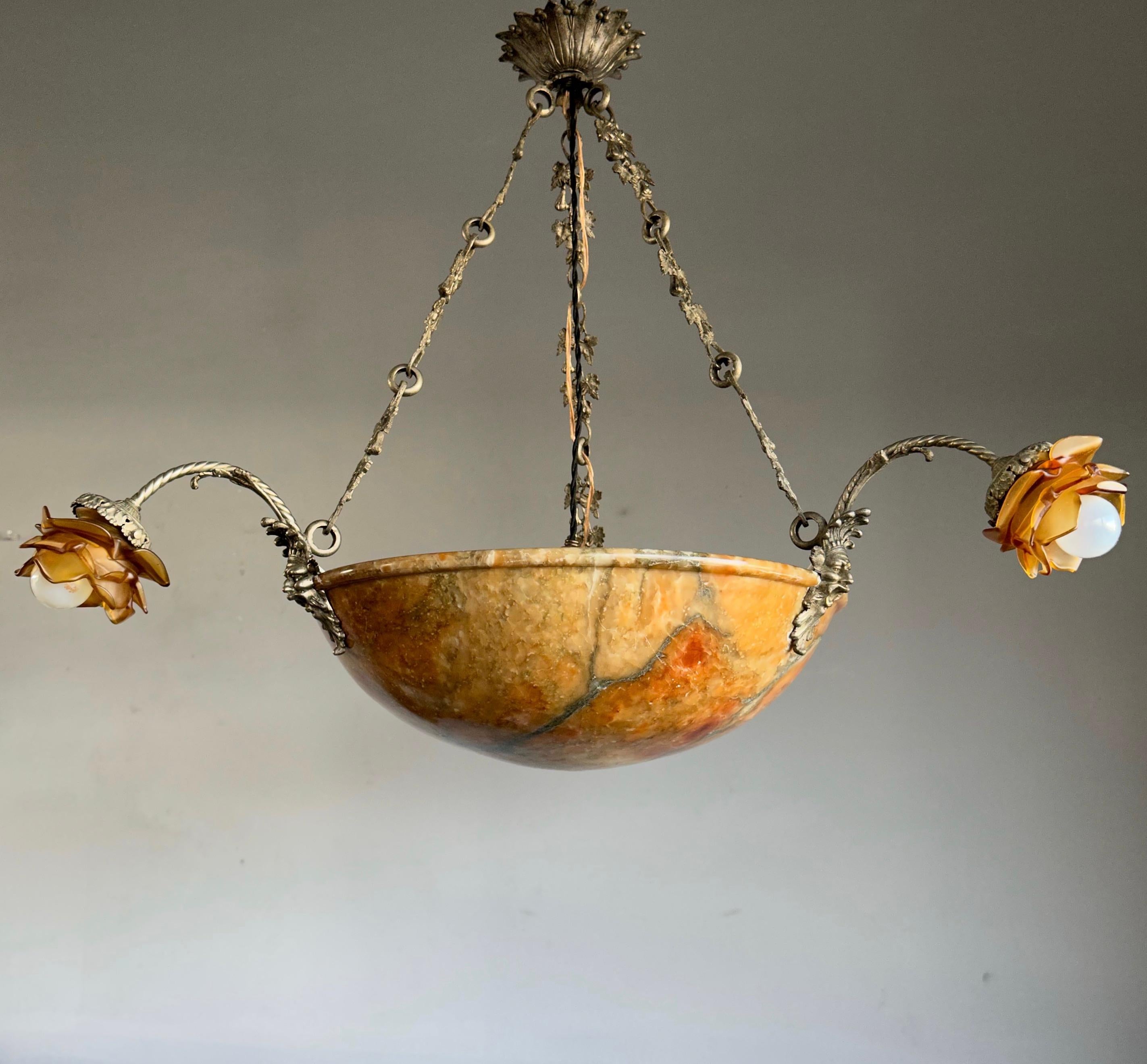 Extremely rare hand carved, early 1900s alabaster chandelier.

If you have been looking for an ideal size and marvelous looking alabaster chandelier for a project or for your own home then this sizeable and unique design specimen could be perfect