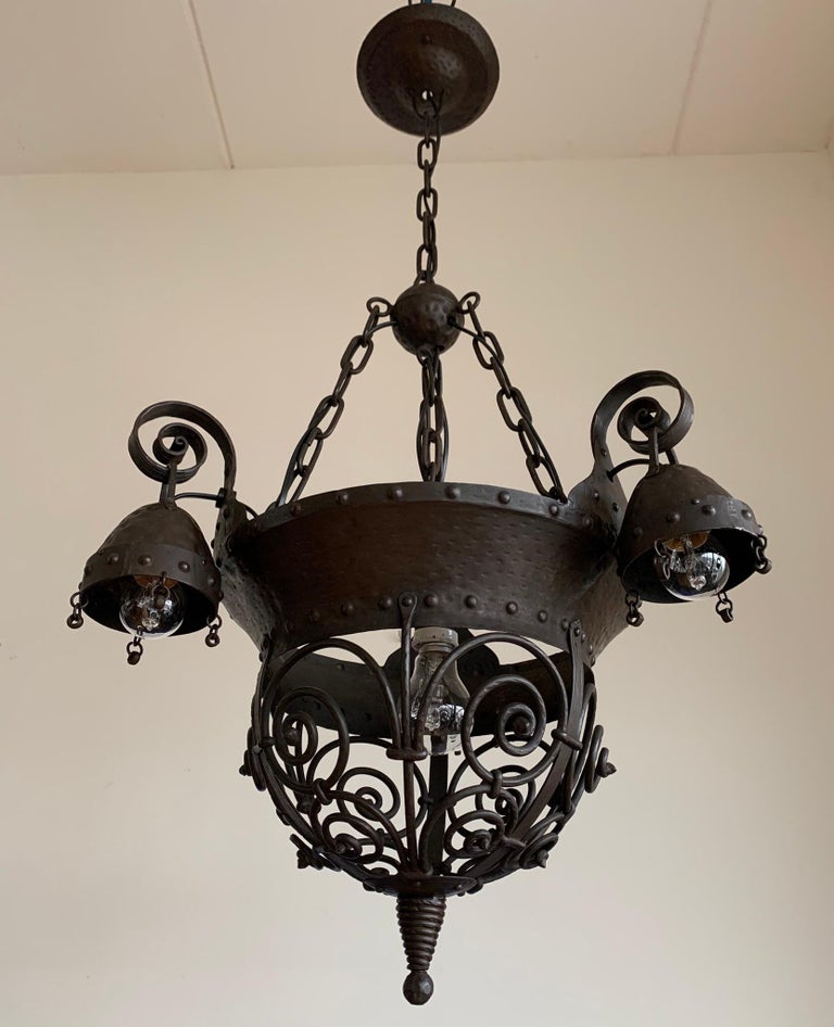 Wonderful and all handcrafted, one of a kind Arts & Crafts pendant light.

If you live in an early 1900s Arts & Crafts home or if you are a collector of unique and stylish home accessories of that period then this handcrafted light fixture could be