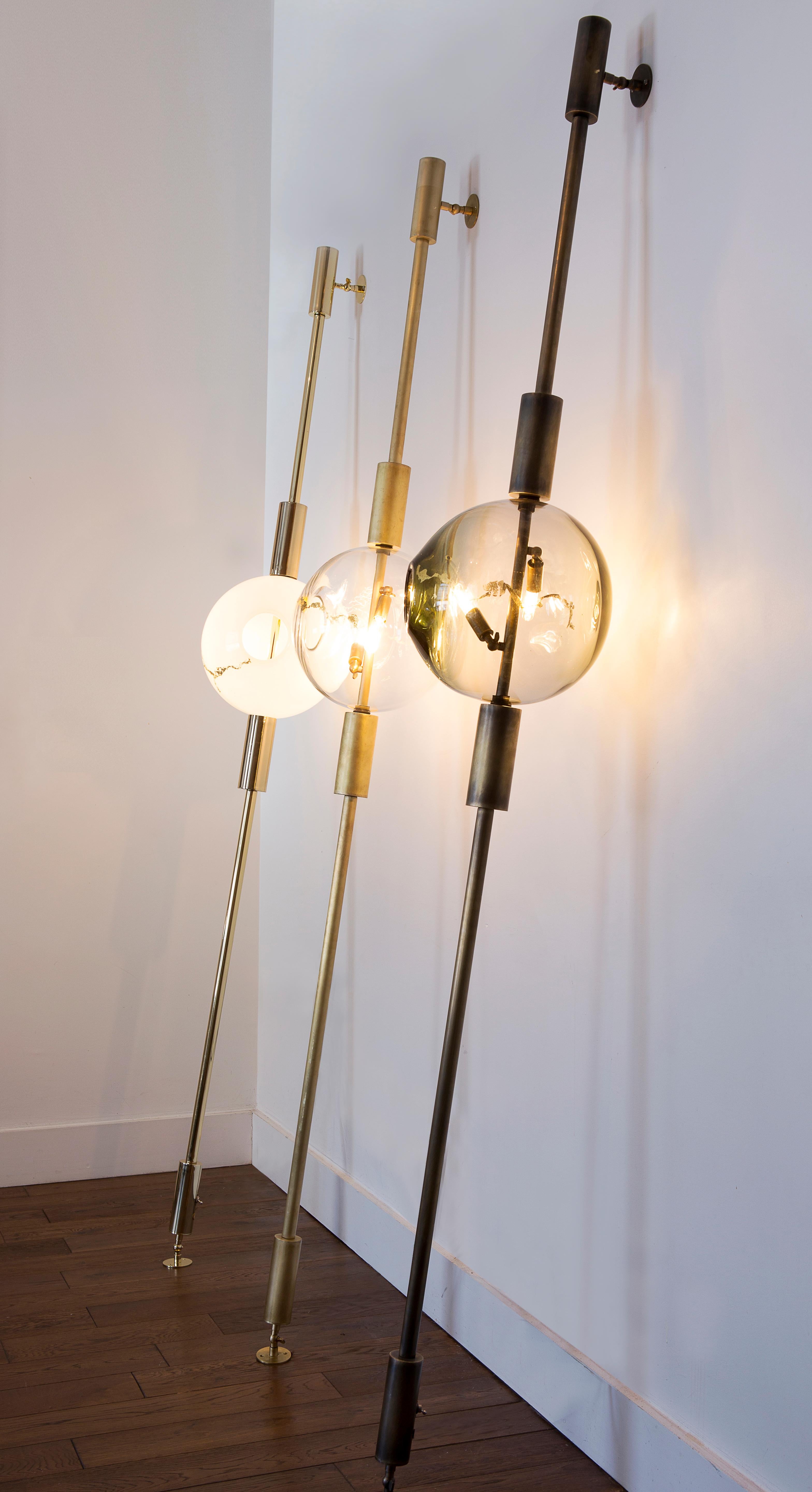 Unique lean light by Ekin Varon
Dimensions: W 30.4 x D 30.4 x H 213.3 cm
Materials: Brass, steel, glass.
Glass color, Metal finish, dimensions can all be customized as our pieces are made-to-order.

Ekin Varon is the founder and creative