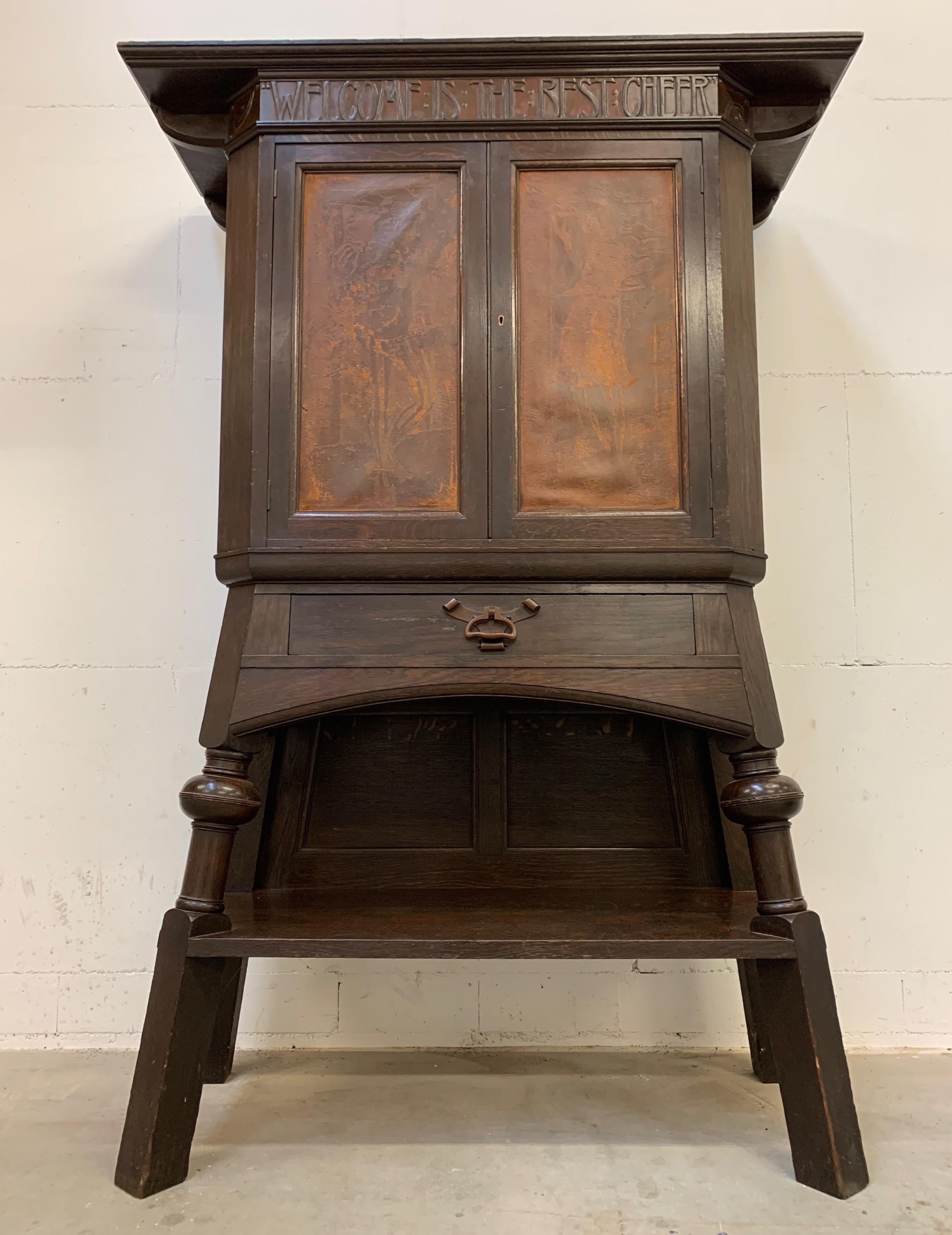 Stunning Arts and Crafts cupboard by one of the greatest.

We are certain that this wonderful handcrafted, stained oak cabinet was designed by Leonard Francis Wyburd (1865-1958). We are certain, because of several style elements that are typical for