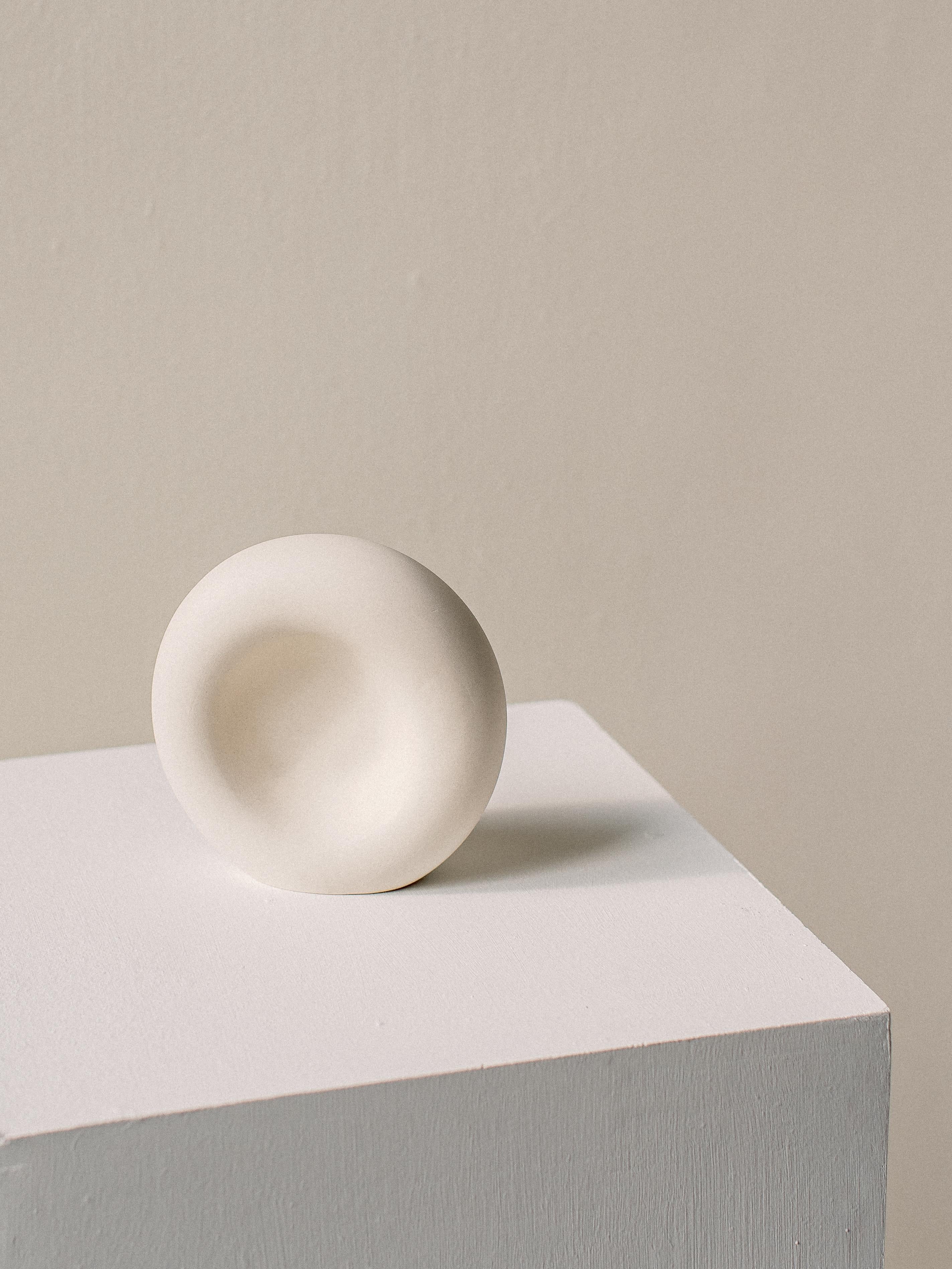 Unique listening form by Dust and Form
Dimensions: D 16.5 x 15 H cm
Materials: Porcelain

Origin Form Collection in three finishes: Hand-sanded (our classic, smooth, bare finish) Ivory (satin white glaze) Charcoal (matte black glaze). Please contact