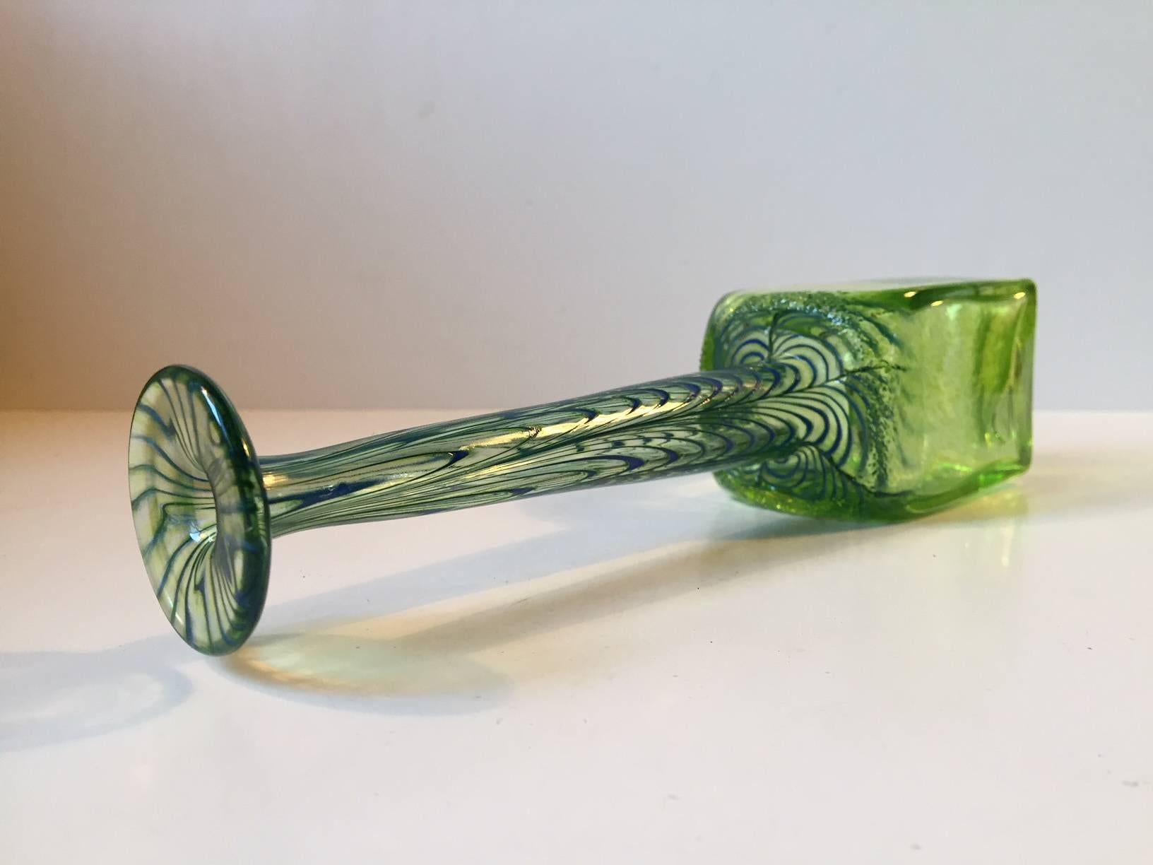 Long-necked green infusion glass vase with blue spirals. Signed and numbered unclear to the base - by unidentified artist/glassmaker. This piece is created in Scandinavia in a style reminiscent of Anthony Schafermeyer and Claire Kelly.