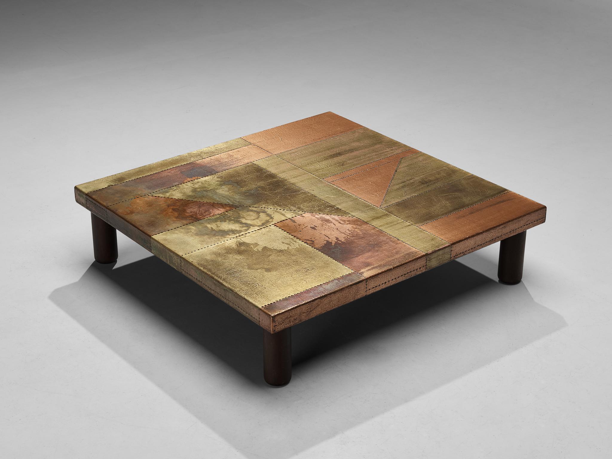 Lorenzo Burchiellaro, coffee table, copper and wood, Italy, 1960s.

This coffee table is an absolute eye-catcher. The copper is in beautiful, patinated condition and the vibrant yet natural oxidation and golden color is something out of this world.