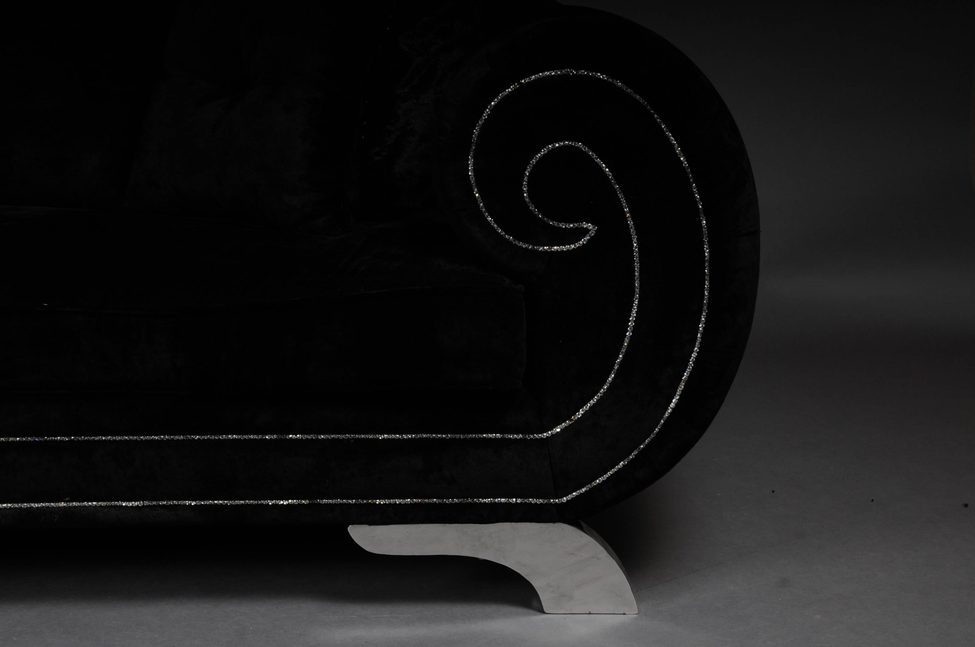 Unique luxurious designer sofa, rhinestones, black velvet. Highlight unusual and high-quality sofa in black velvet. Body refined with rhinestones. Sofa stands on four chrome feet. Very modern, comfortable and an absolute eye-catcher. Very noble and