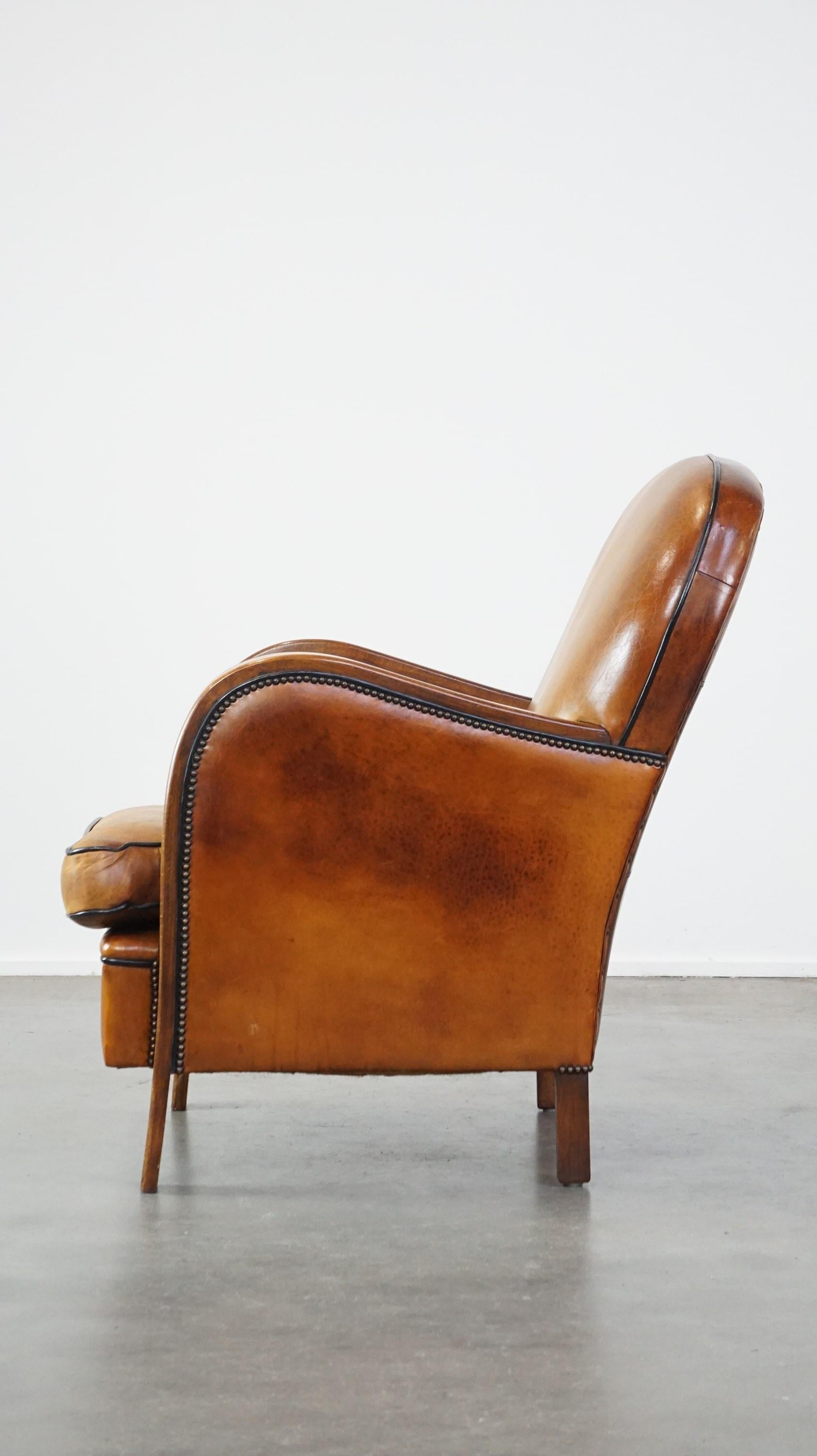 Unique, luxurious sheepskin armchair combined with wood In Fair Condition For Sale In Harderwijk, NL