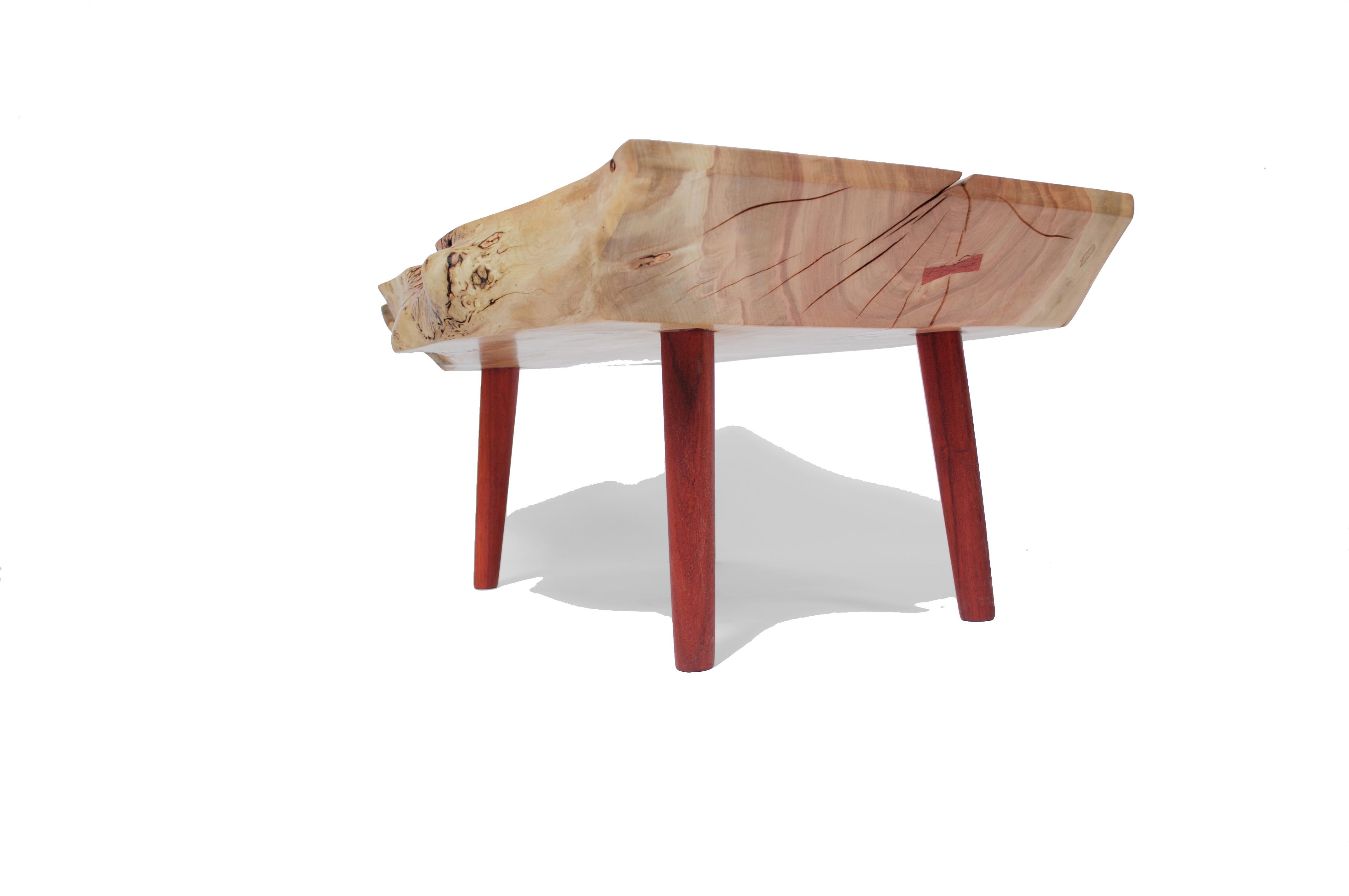 Unique signed table by Jörg Pietschmann
Materials: Norway maple, Padouk
Measures: H 38 x W 84 x D 61 cm

In Pietschmann’s sculptures, trees that for centuries were part of a landscape and founded in primordial forces tell stories inscribed in the