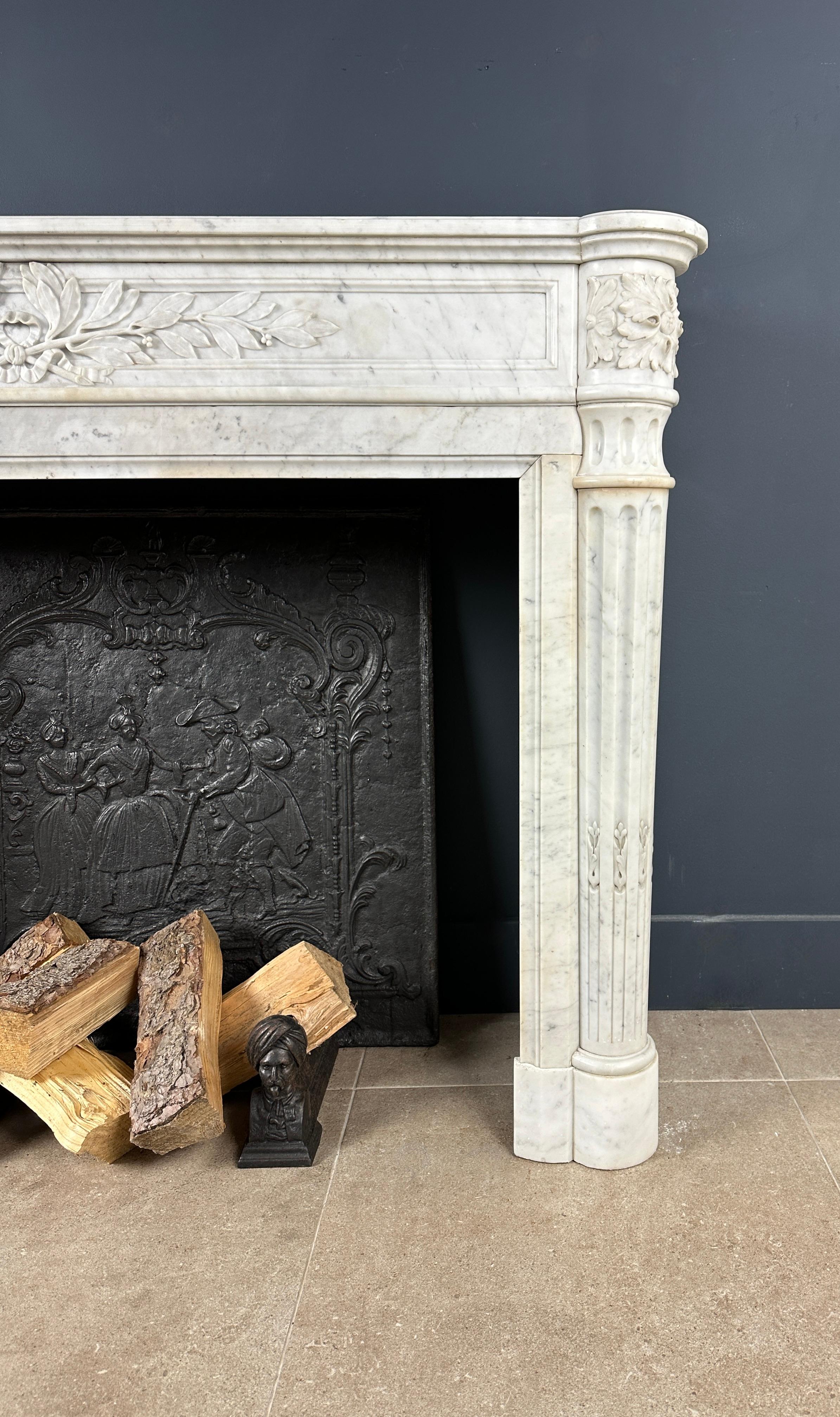 Discover the opulence of the Unique Marble French Fireplace from the Opéra Garnier in Paris, crafted with exquisite Carrara marble and infused with the refinement of the Luise XVI style. The beautiful detail in the front catches your attention