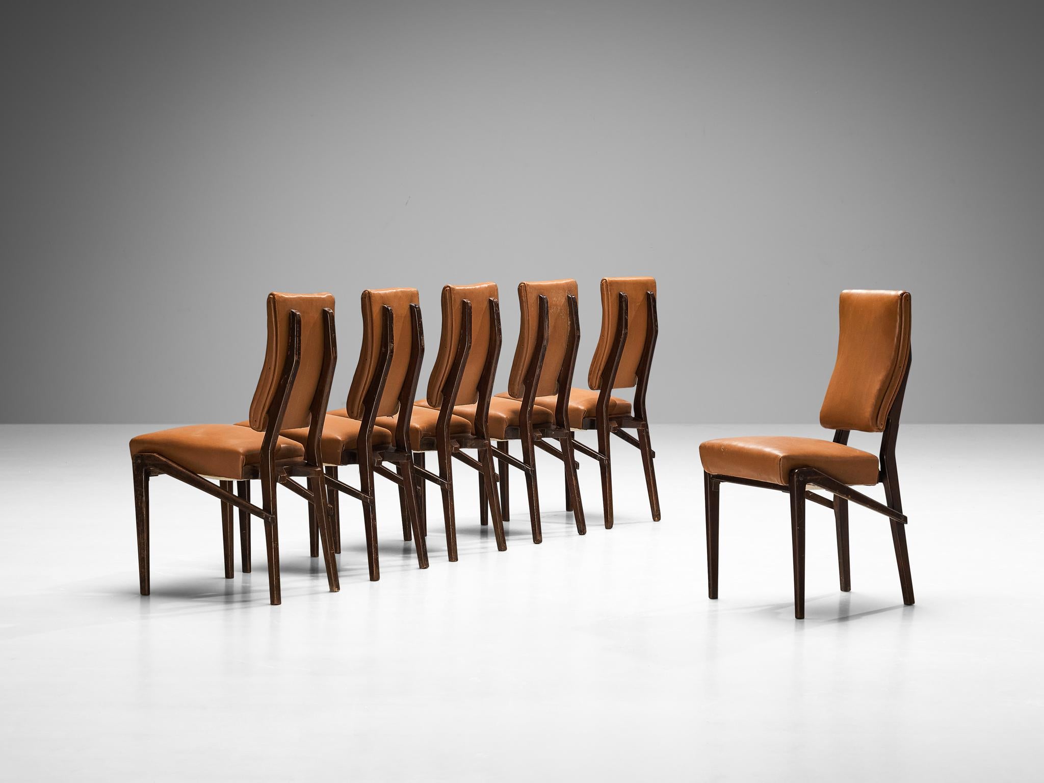Mario Oreglia, set of six dining chairs, faux leather, lacquered wood, Italy, 1950s

Mario Oreglia (1916-1989) emerged as one of the leading furniture designers in the post-World War II era. His designs gained widespread recognition, frequently