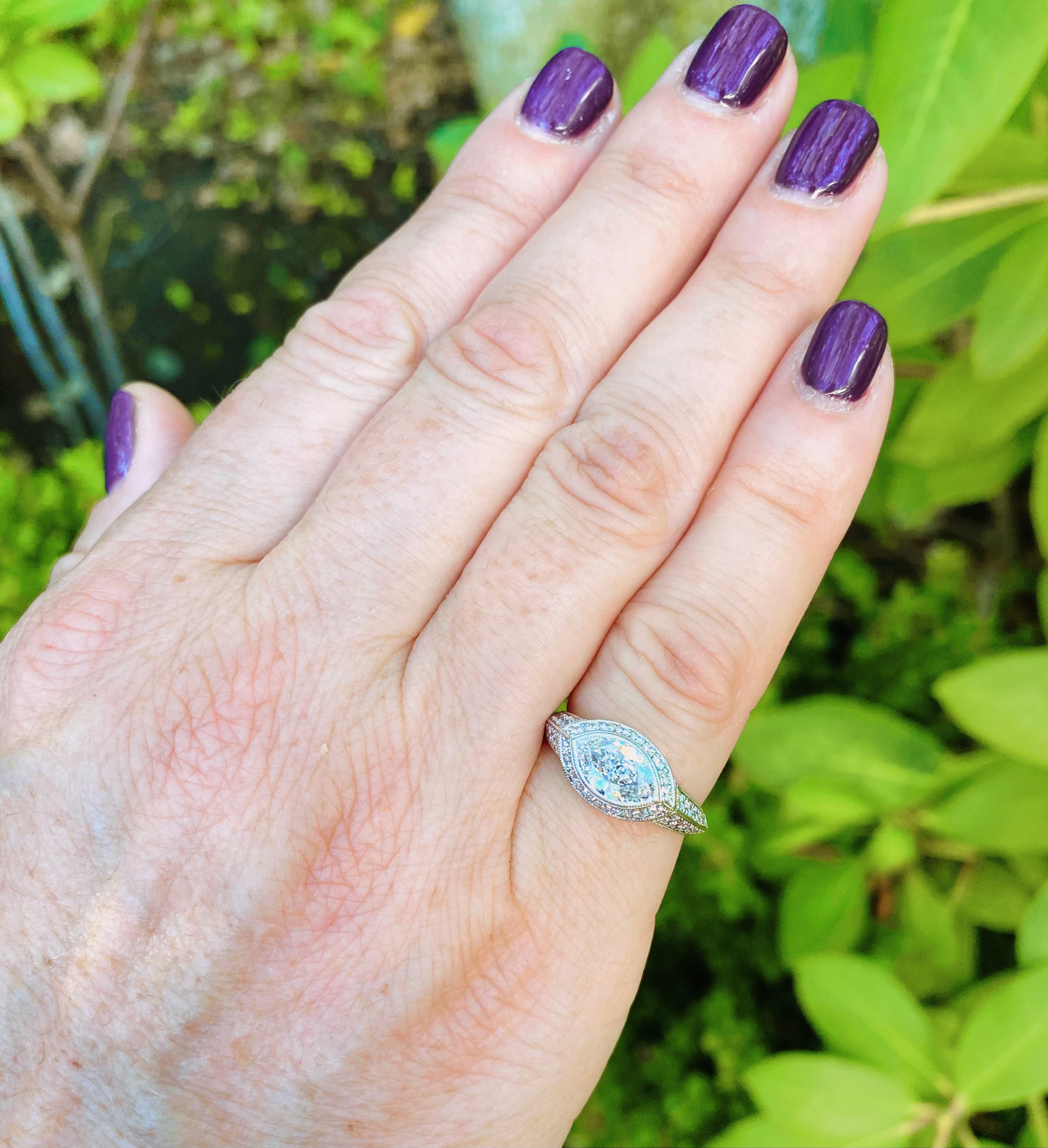 Modern Unique Marquise Cut Platinum Diamond Ring For Sale