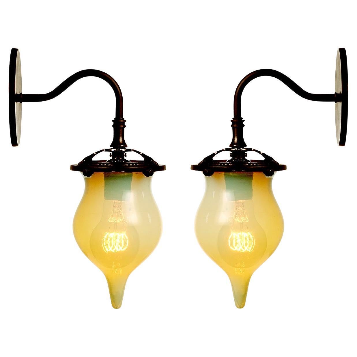 Unique Matching Pair of Teardrop Vaseline Glass Sconces