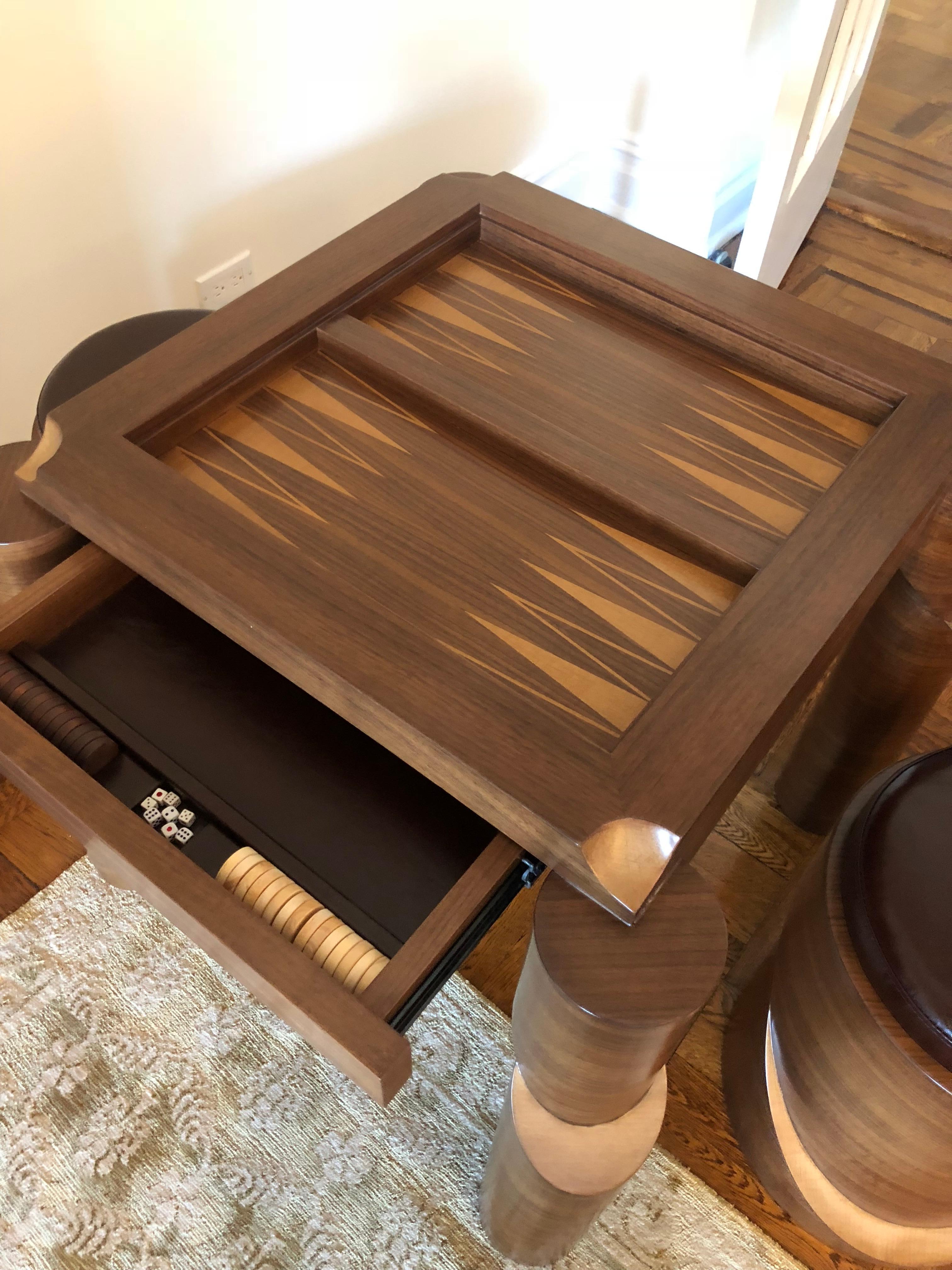 Unique Matte Grandmaster’s game table by Ekin Varon
Dimensions: W 101.6 x D 101.6 x H 76.2 cm
 Stools: D 35.5 x 43.1
Materials: Walnut, maple veneer, leather.


Backgammon & Chess

The ancient game of chess is based on strategy and winning