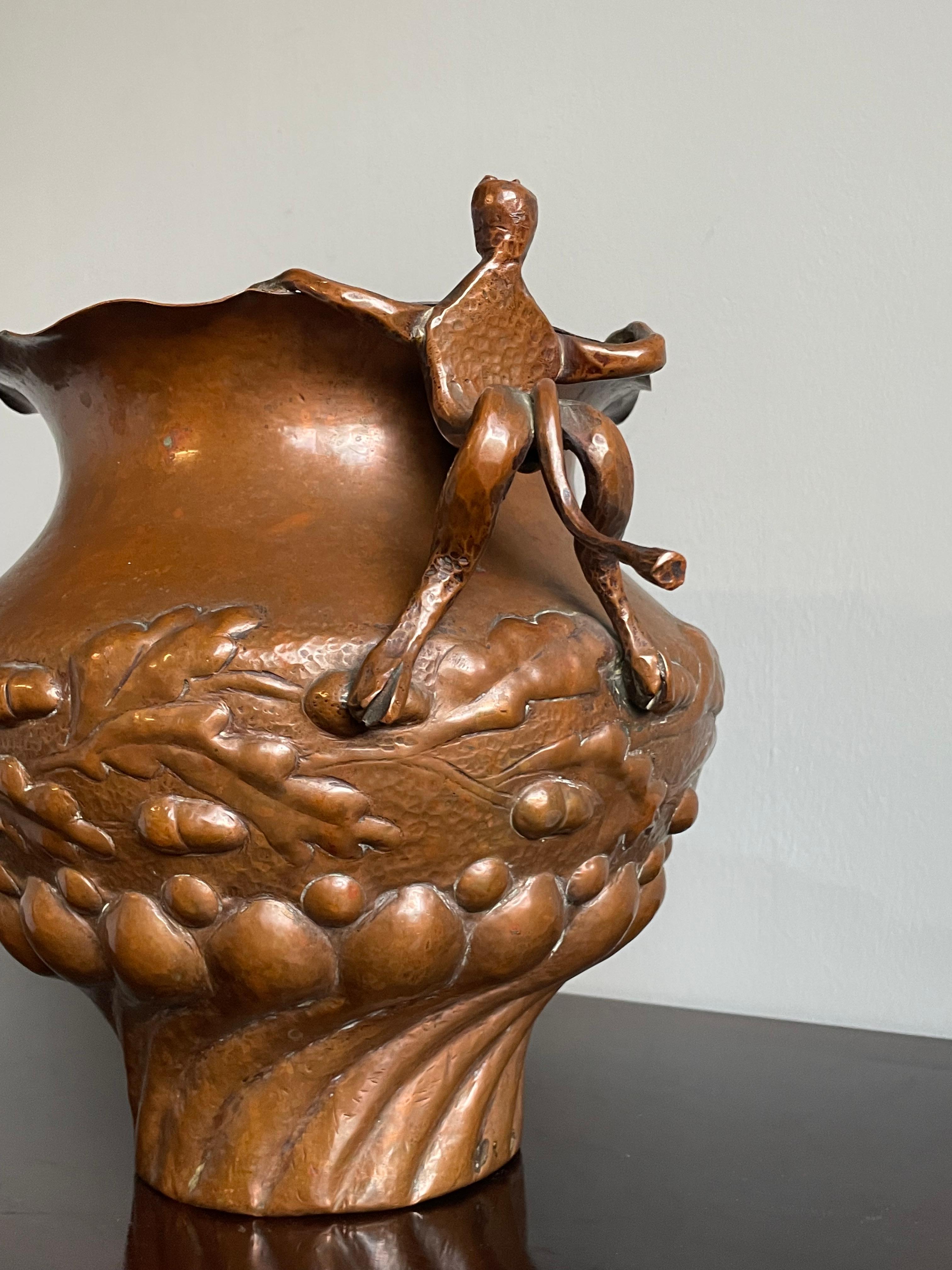 Museum quality, embossed copper planter with rare satyr theme.

This stunning and superbly hand-crafted antique copper planter or vase is another one of our recent unique finds. It has the most amazing, deeply embossed acorn and oak leaf patterns