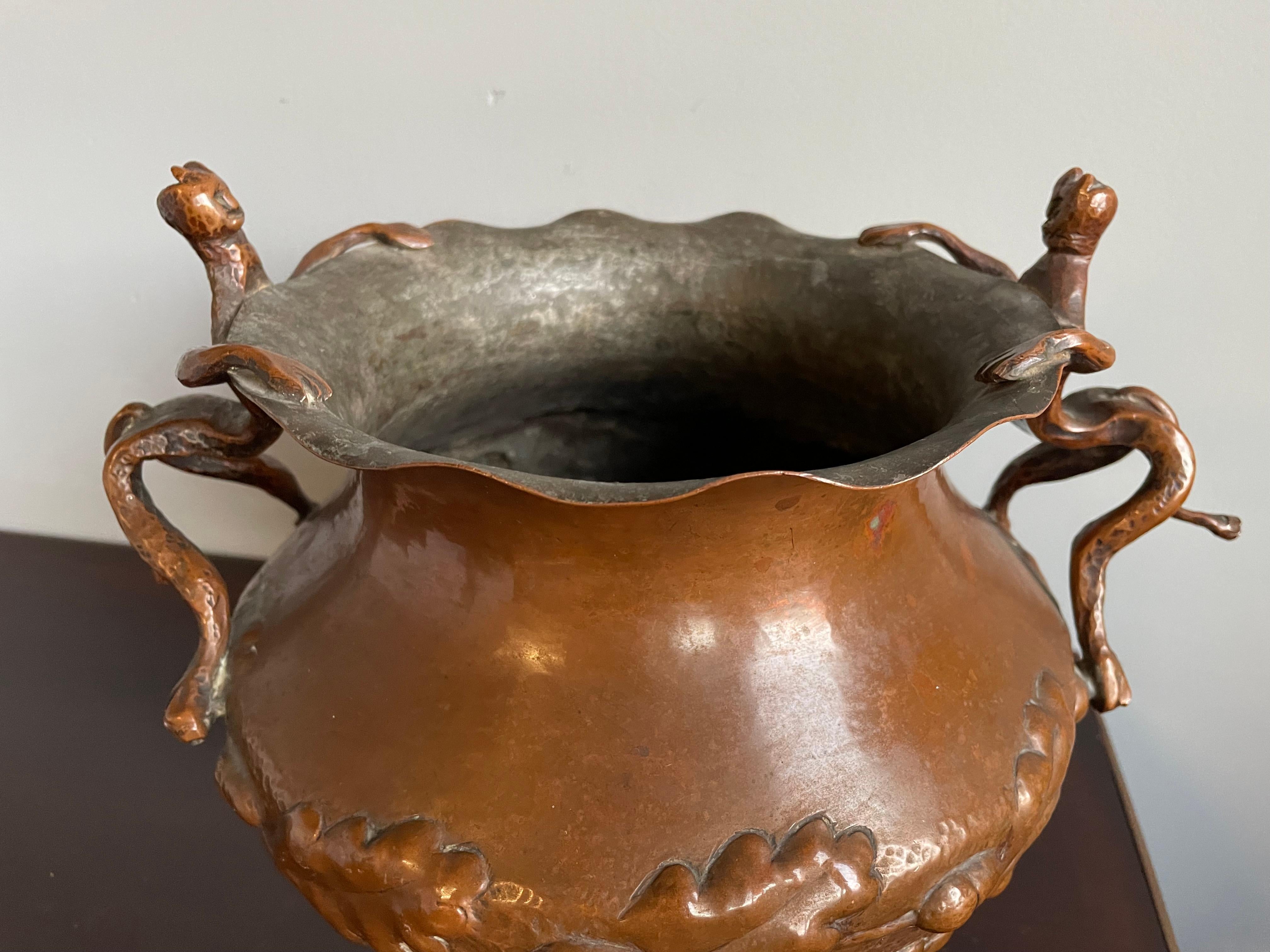 European Unique Mid 1800s Embossed Copper Planter / Vase with Satyr Sculptures as Handles For Sale