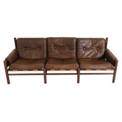 Unique Mid century low sling Brown leather safari 3 seat sofa by Bruksbo