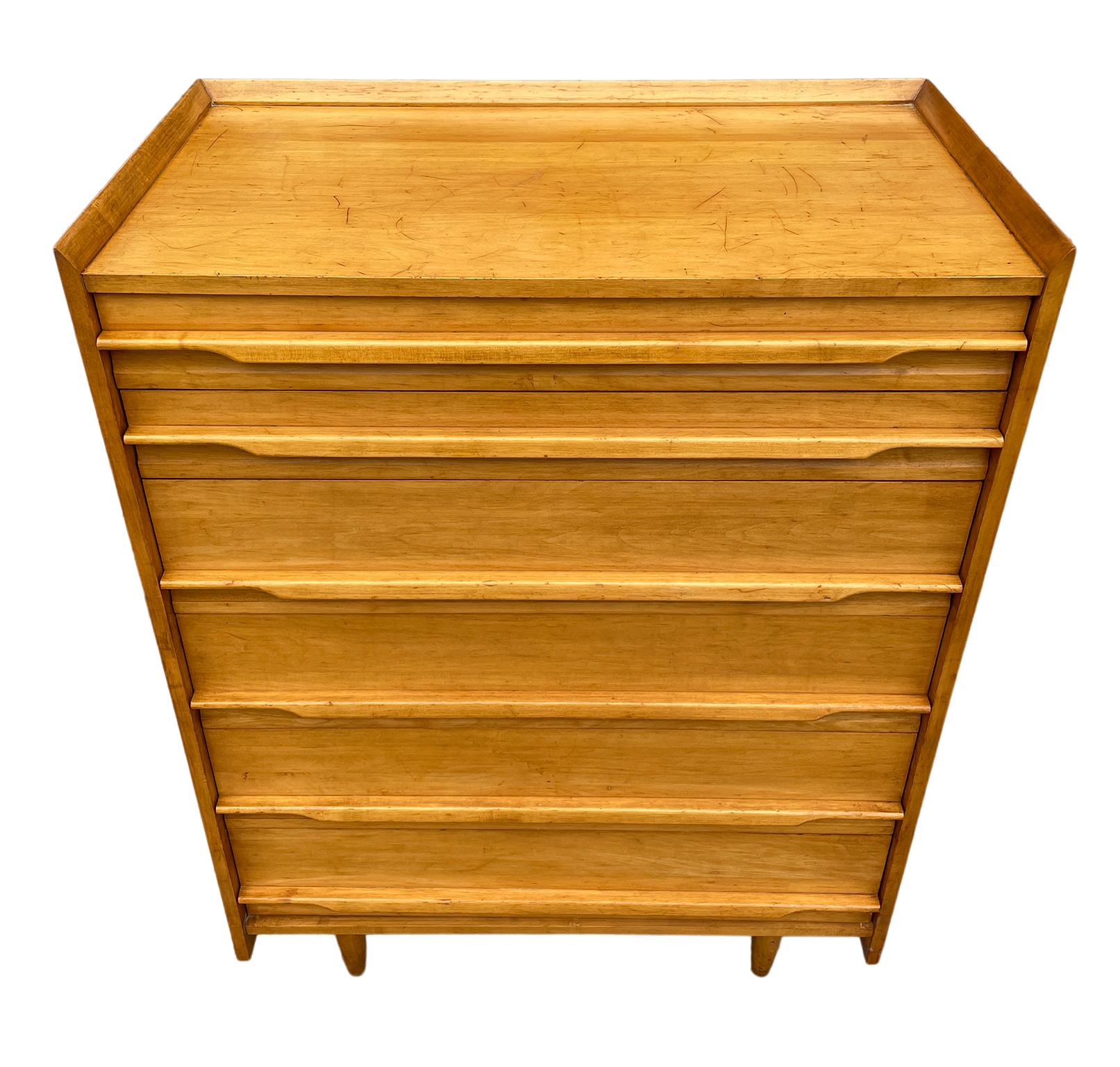 Unique Mid-Century Modern American solid maple tall 6 drawer dresser by Crawford. All solid maple construction with carved handles and sits on 4 tapered legs. Vintage original condition. Shows wear on top surface drawers clean inside. Metal tag