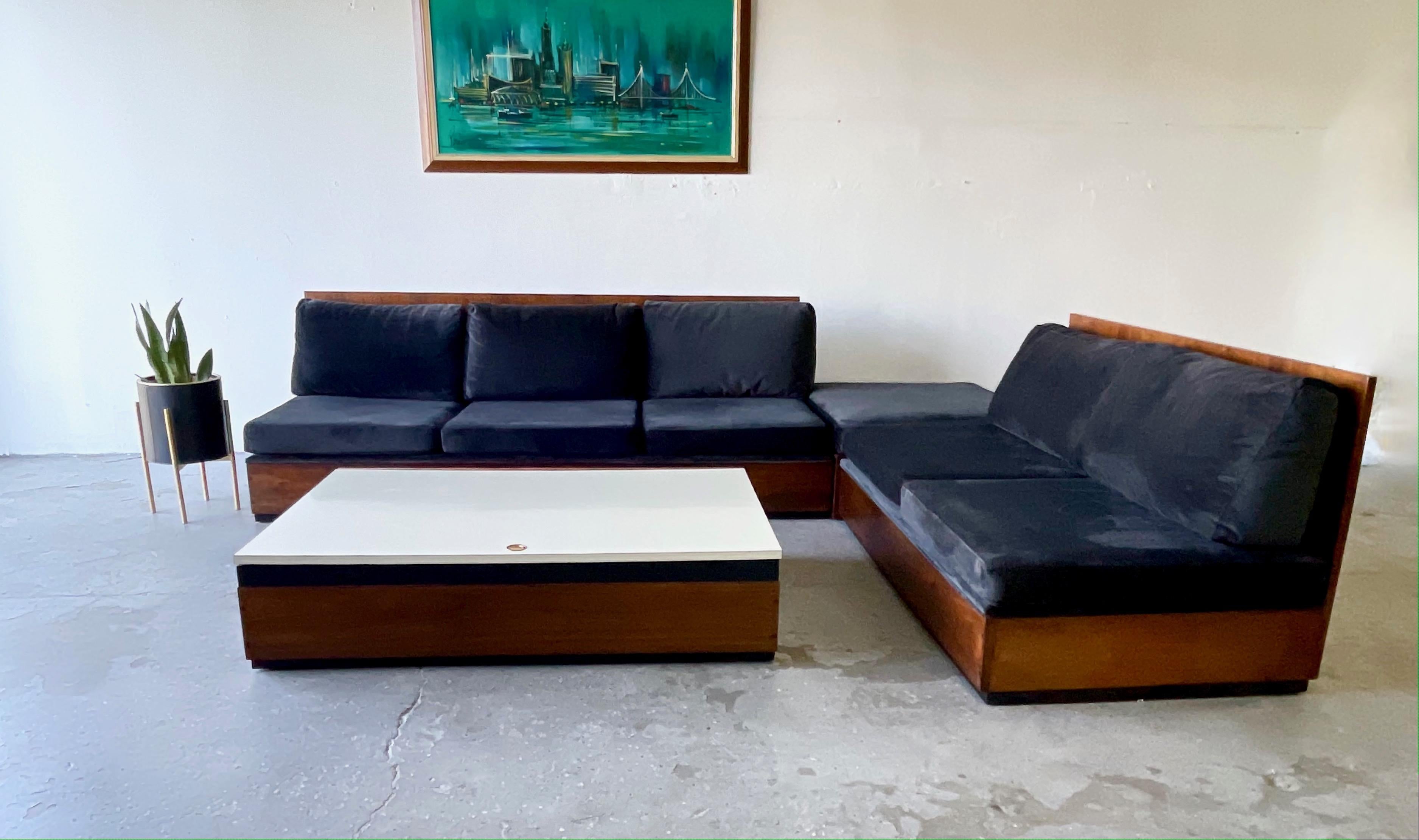 Milo Baughman era sectional with walnut frame Each section can be separated and rearranged to make larger or smaller. It is very sturdy and very high quality construction. Color black charcoal Material is velvet type very soft. Sofa has recently