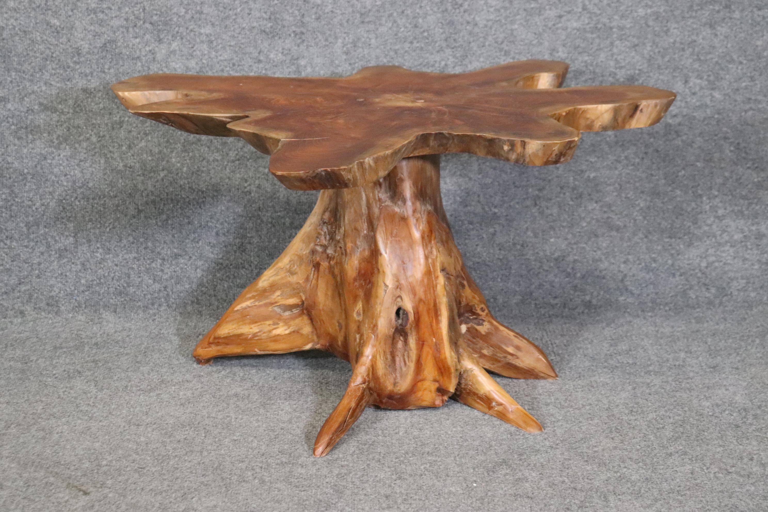 This is a very cool mid century modern era tree root coffee table. The table is made up of two pieces and has incredible grain figuring and age cracks and 