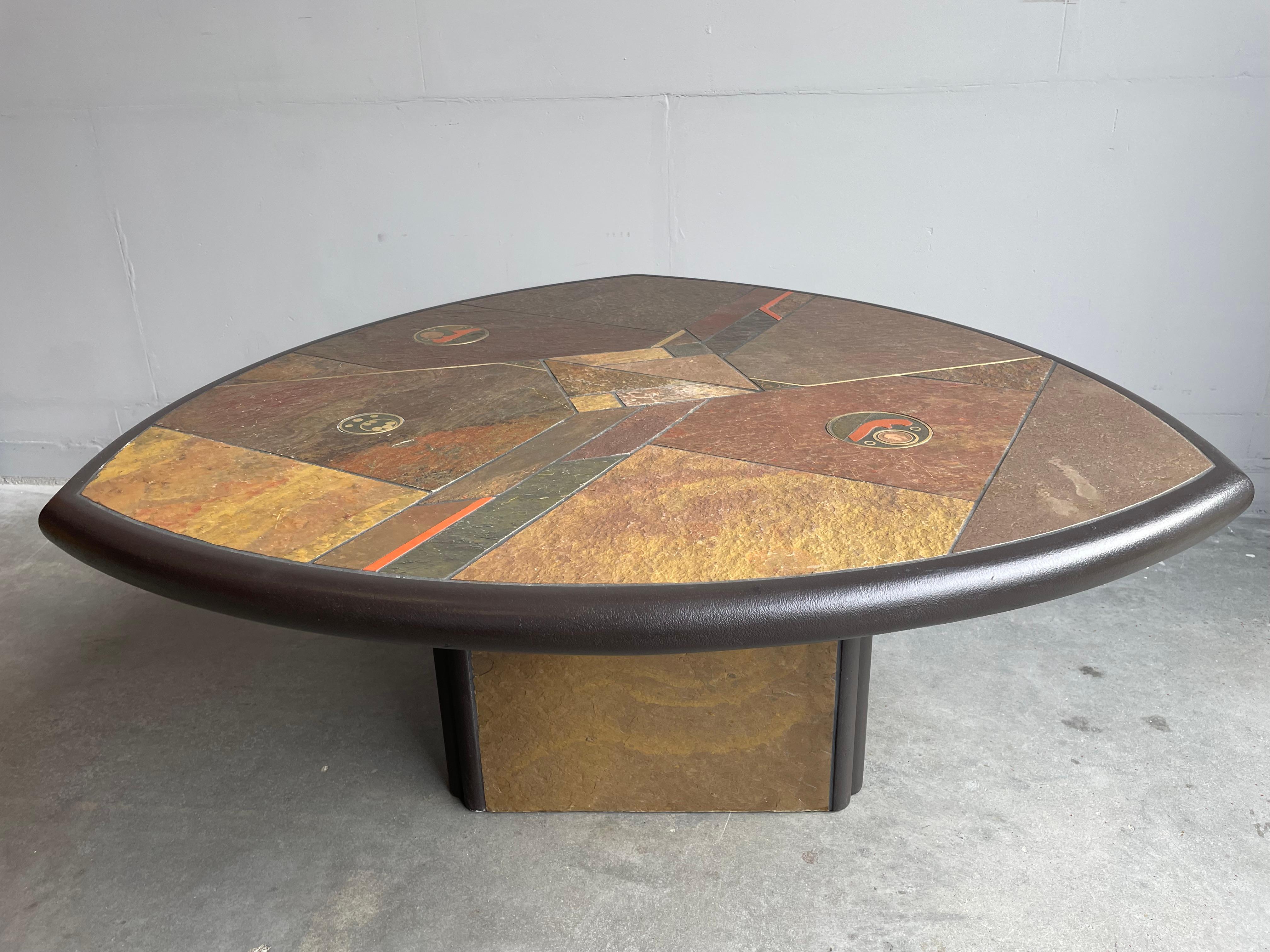 Extremely rare, triangular midcentury coffee table by Dutch designer Paul Kingma.

If you have been looking for a stylish and rare, midcentury modern coffee table then you may have before come across brutalist coffee tables by Paul Kingma. With