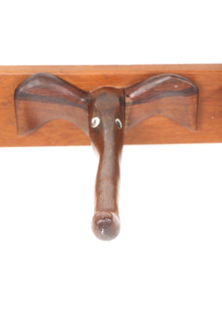 Danish Unique Midcentury Wall-Mounted Coat Rack in Solid Rosewood, Made in Denmark For Sale