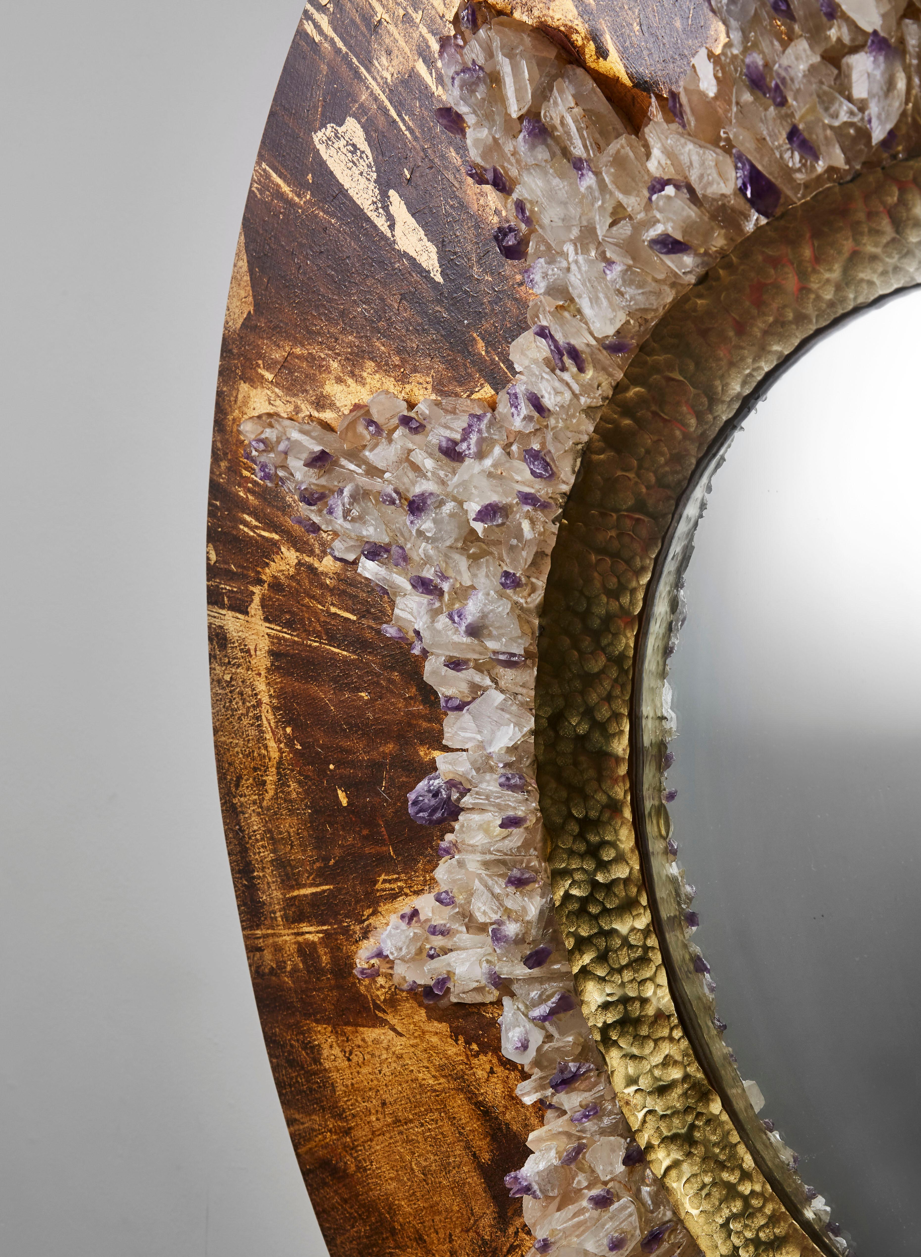 Unique mirror in gilt wood, semi precious stones and hammered brass frame.
France.