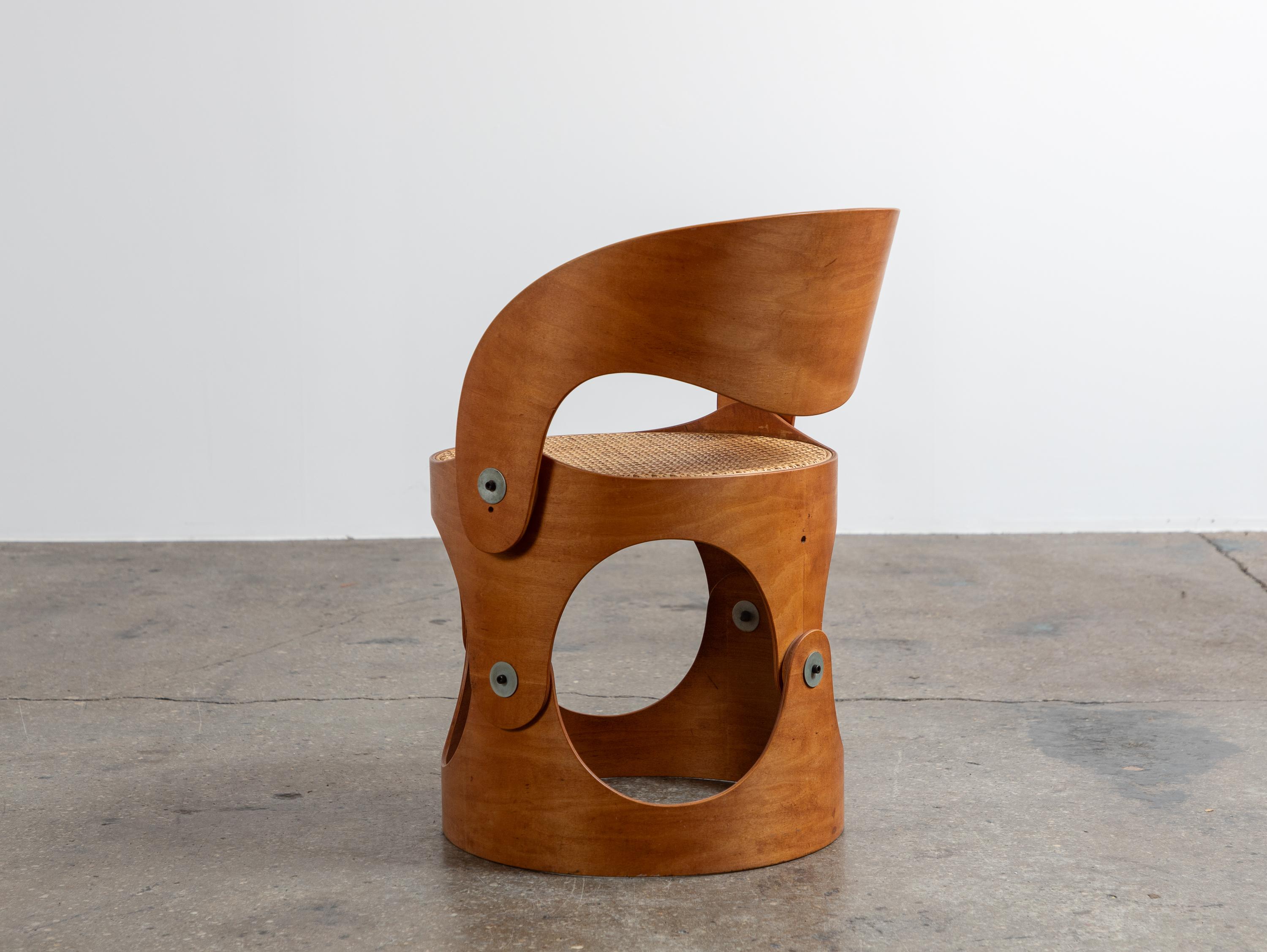 Molded Unique Modernist Bent Plywood Cane Chair by Leandre Poisson For Sale