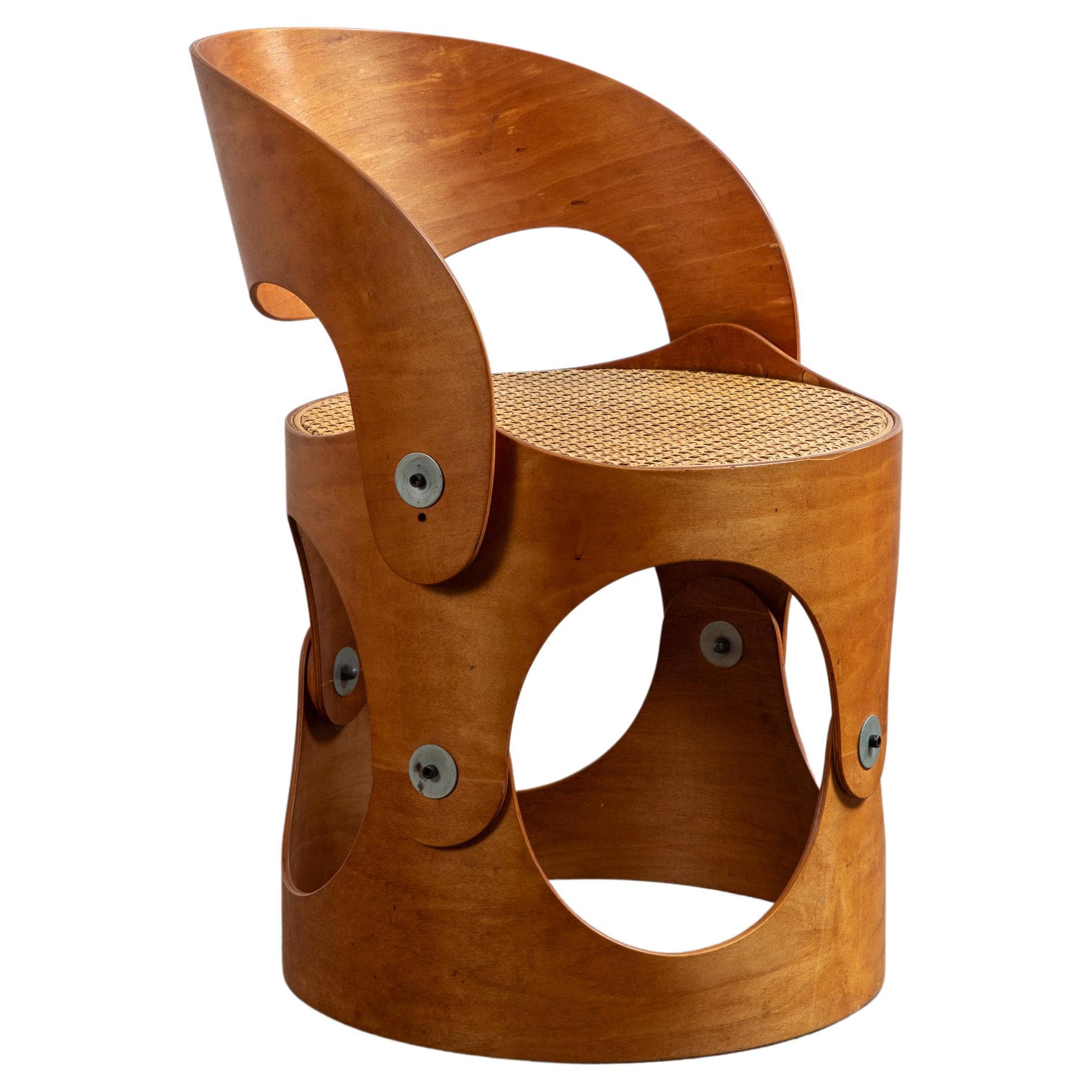 Unique Modernist Bent Plywood Cane Chair by Leandre Poisson For Sale