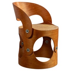 Unique Modernist Bent Plywood Cane Chair by Leandre Poisson
