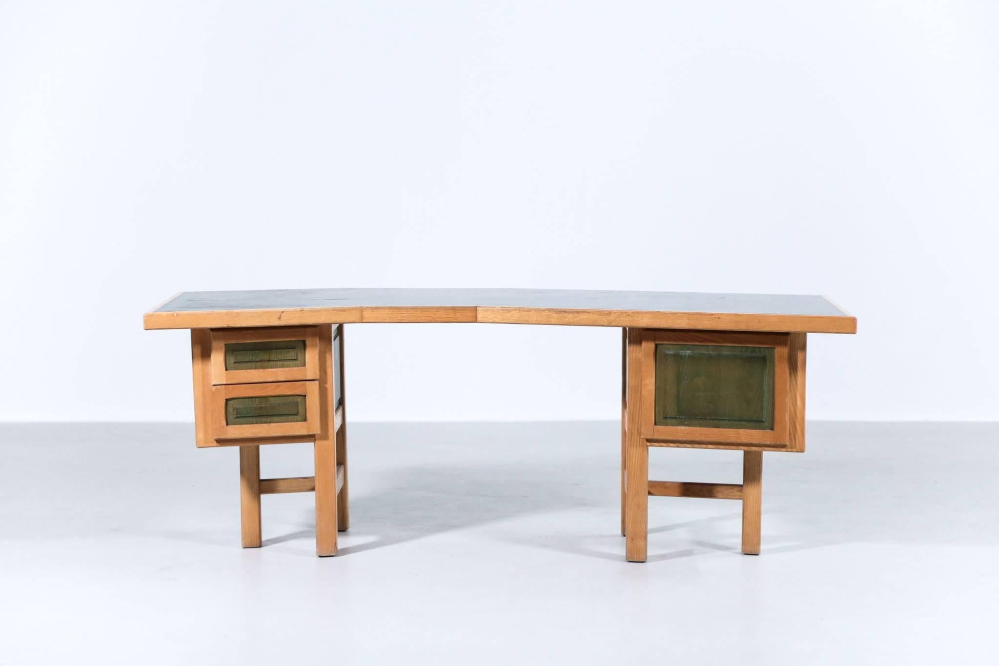 Unique modernist design desk manufactured by cabinetmaker. 
Three green drawers with dark green top (width 73cm).