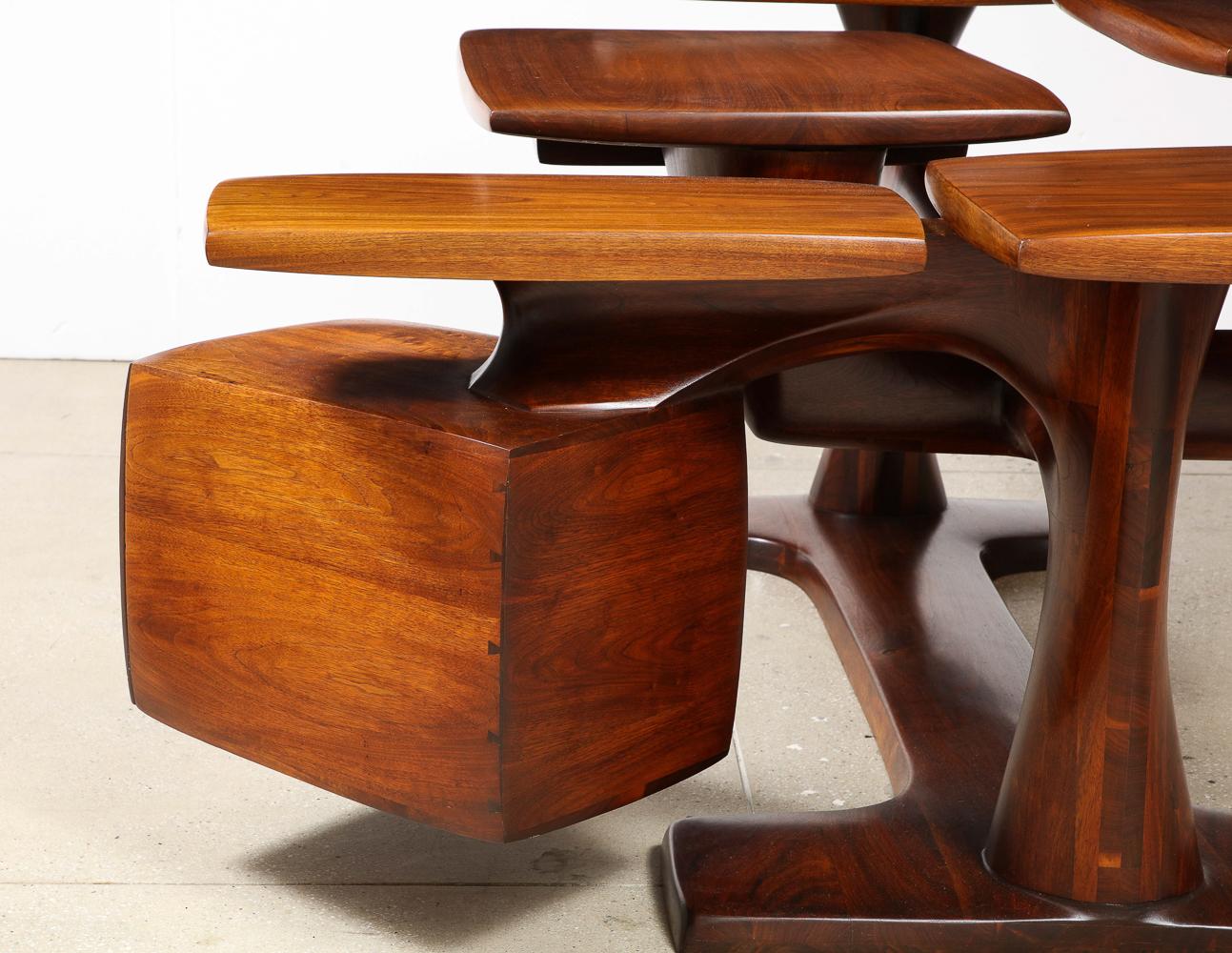 Walnut. Organic-from structure, with 5 independent arms. Each arm supporting a horizontal surface. This desk has 2 pencil drawers & one large file drawer. A fantastic California studio piece that was exhibited at the Pasadena Museum in 1971 as part