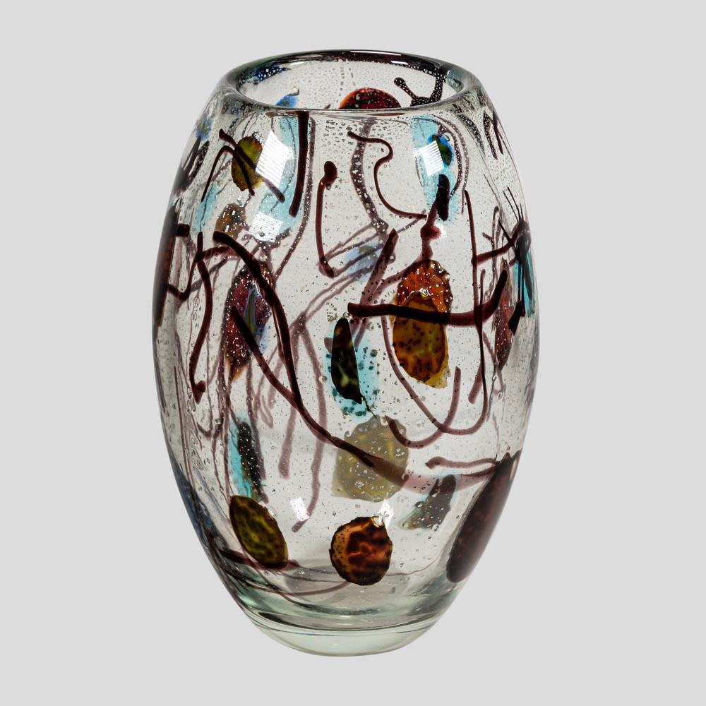 A unique Murano blown glass vase. submerged multicolour abstract decoration with silver inclusions.
Made in Italy