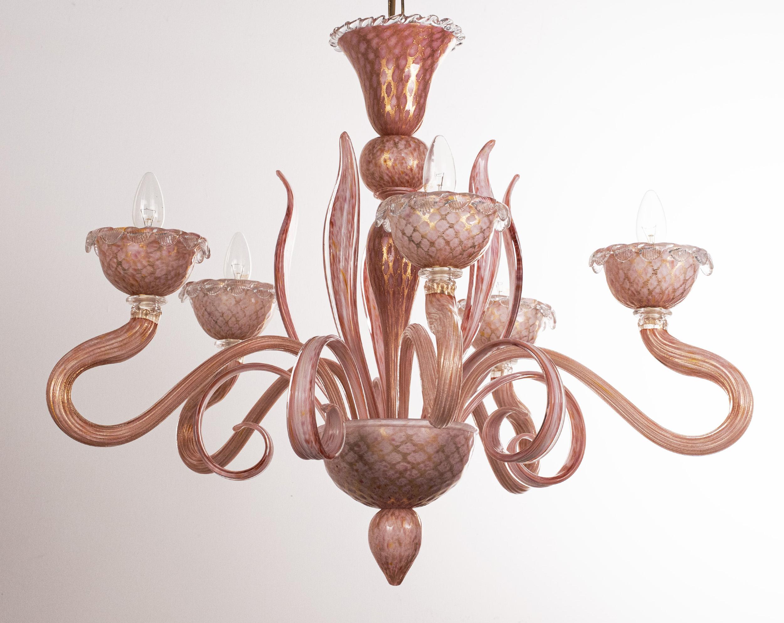 Unique Murano Pink gold glass chandelier 5 lights Vintage Made in Italy in stock
Condition: virtually perfect condition and never used: no heavy scratches, no defects, no cracks no missing parts.
 
Type: Venetian chandelier
Dimensions: Ø80 x h65 cm