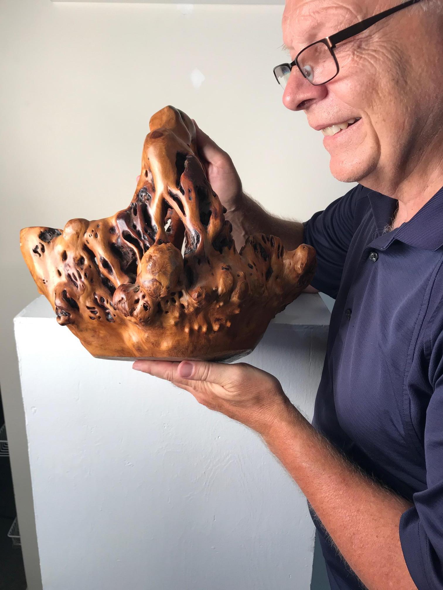An attractive example of a burl wood natural organic wood flower basket crafted from a single Japanese wood root and burl. This stunning single root handled basket is beautifully finished. 

Dimensions: 12 inches high and 13 inches wide.

Would