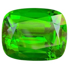 Unique Natural Green Peridot Gemstone: 83.12 Carat Cushion Cut Burma Origin